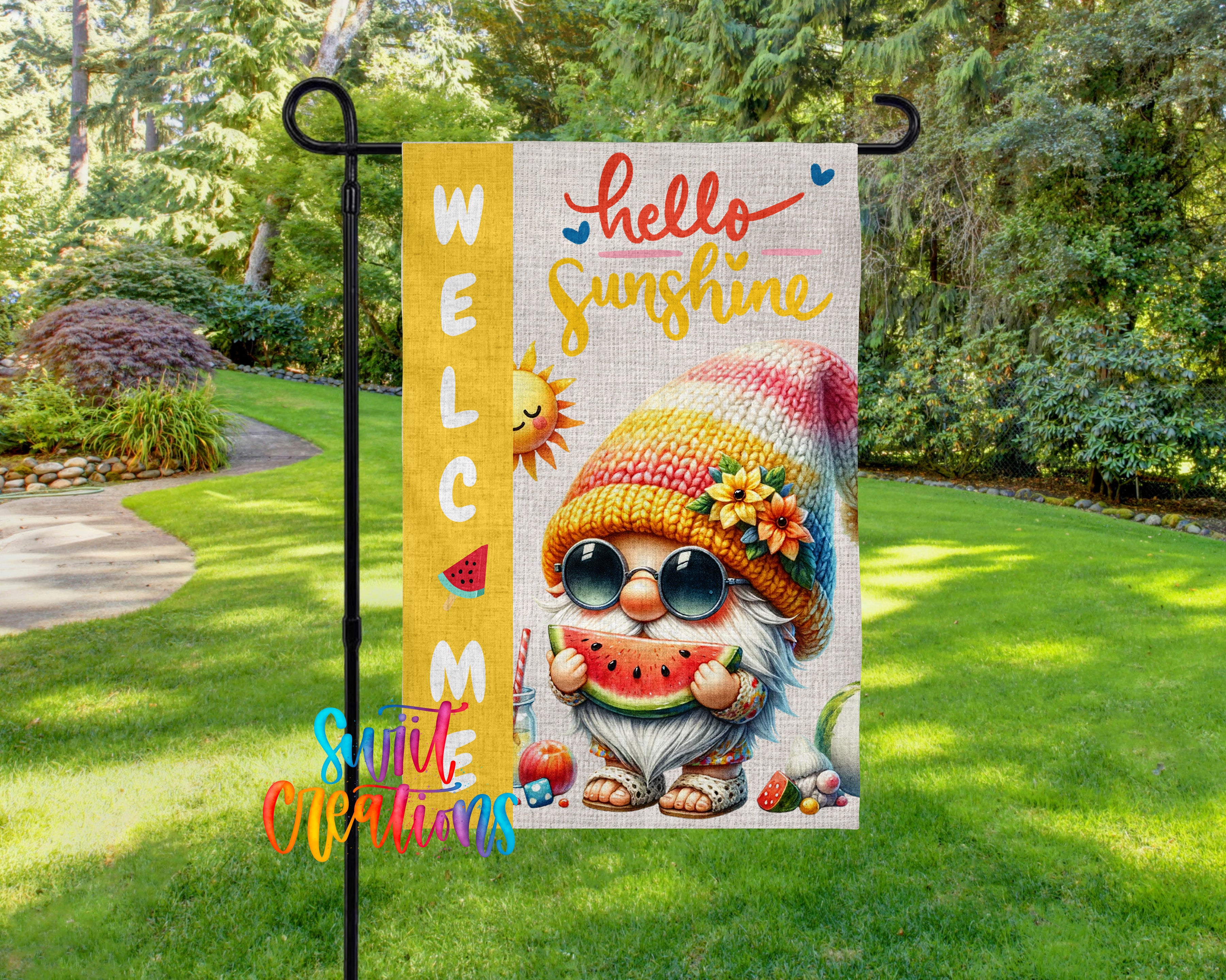 A colorful garden sign featuring a gnome character with sunglasses and a watermelon slice, surrounded by a lush green lawn and trees.