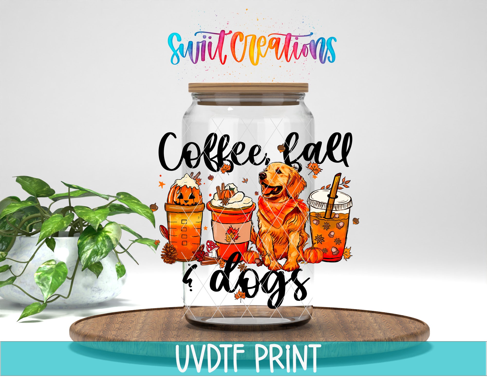 A glass jar with a lid, featuring illustrations of a dog, a pumpkin, and a cup of coffee, along with the text "Coffee, fall & dogs". The jar is placed on a wooden surface, and there is a plant in the background.