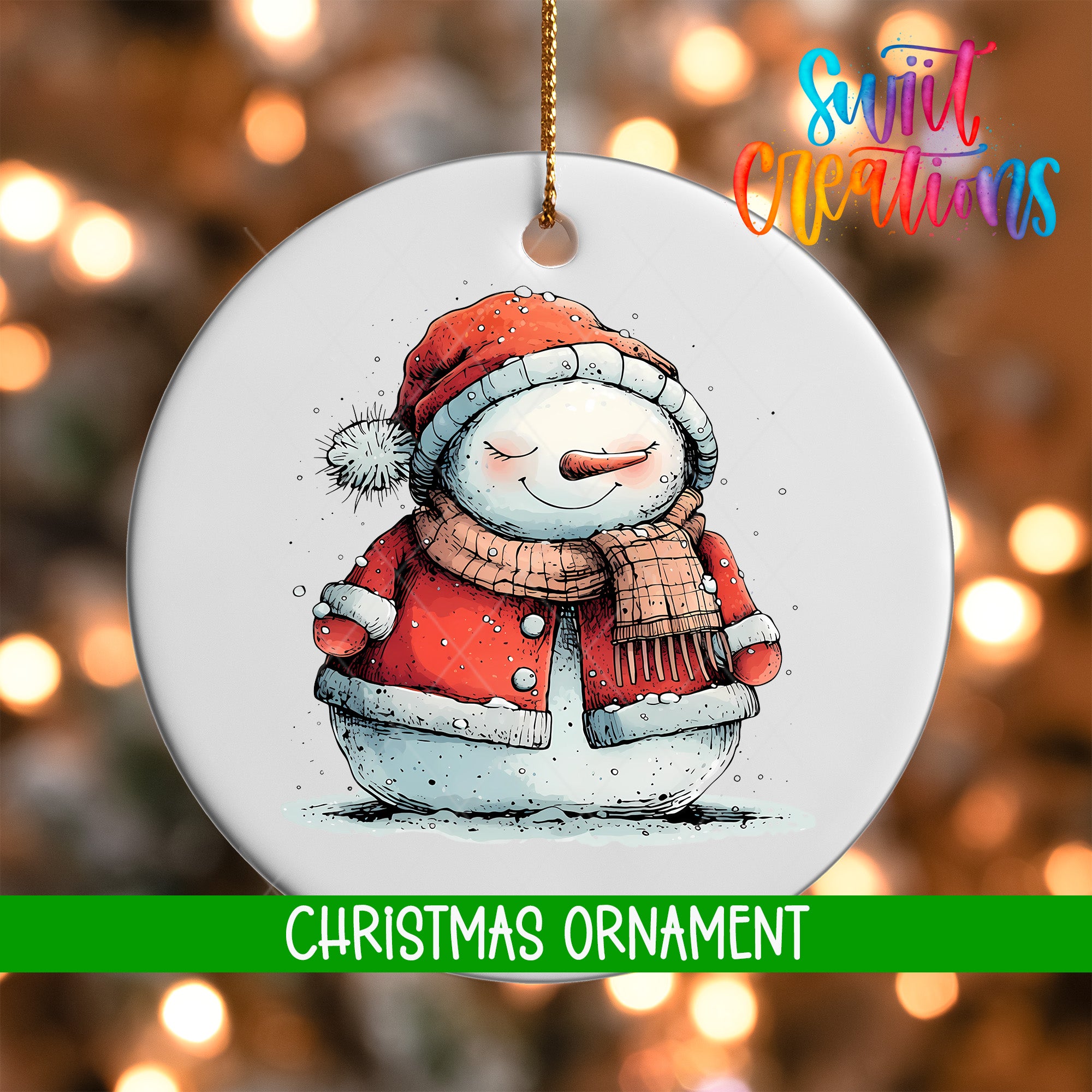 A white Christmas ornament featuring a snowman wearing a red coat and scarf, with a green ribbon around its neck.