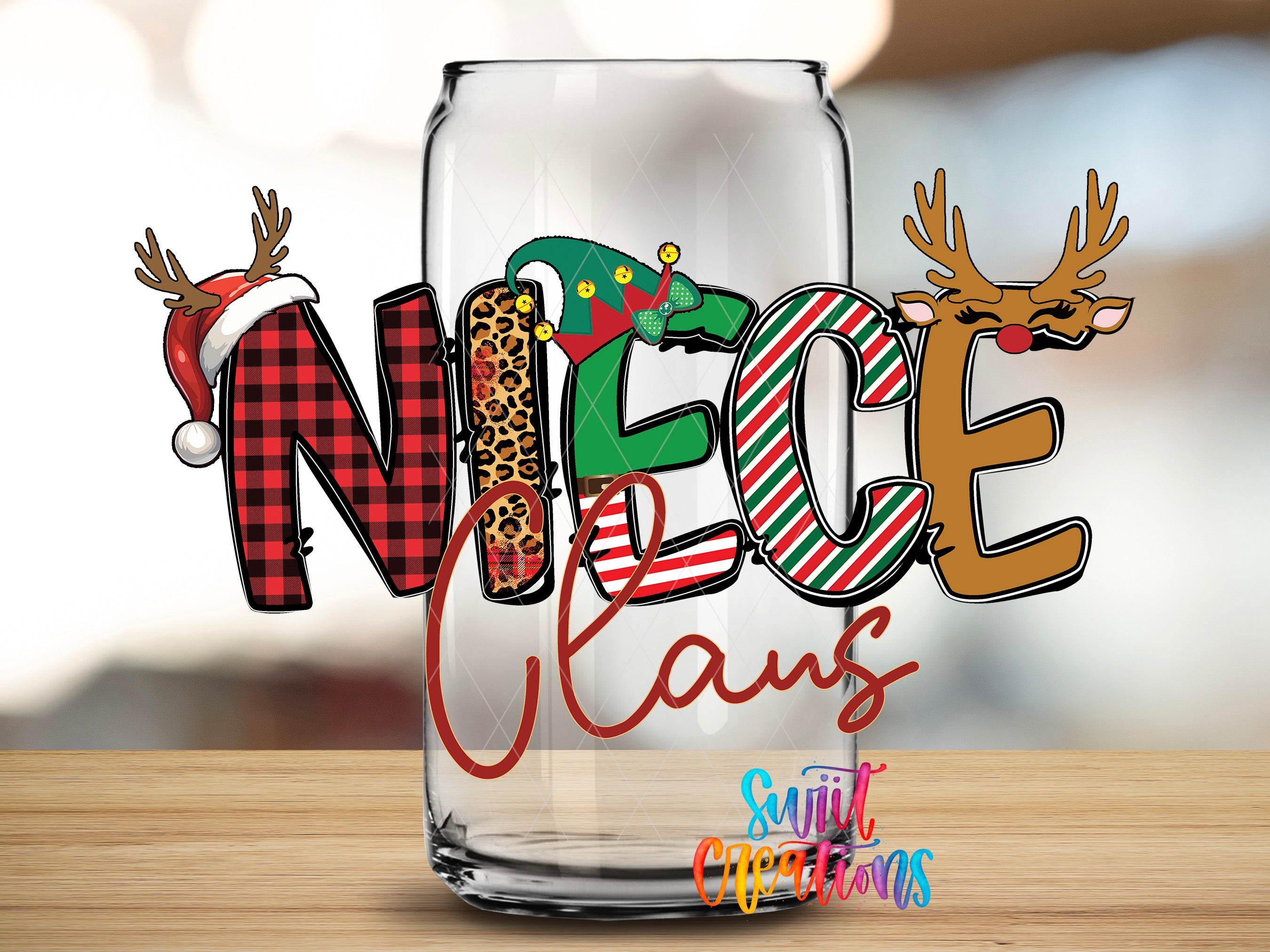 A glass jar with the word "Niece" written on it, along with illustrations of reindeer and a Santa hat.