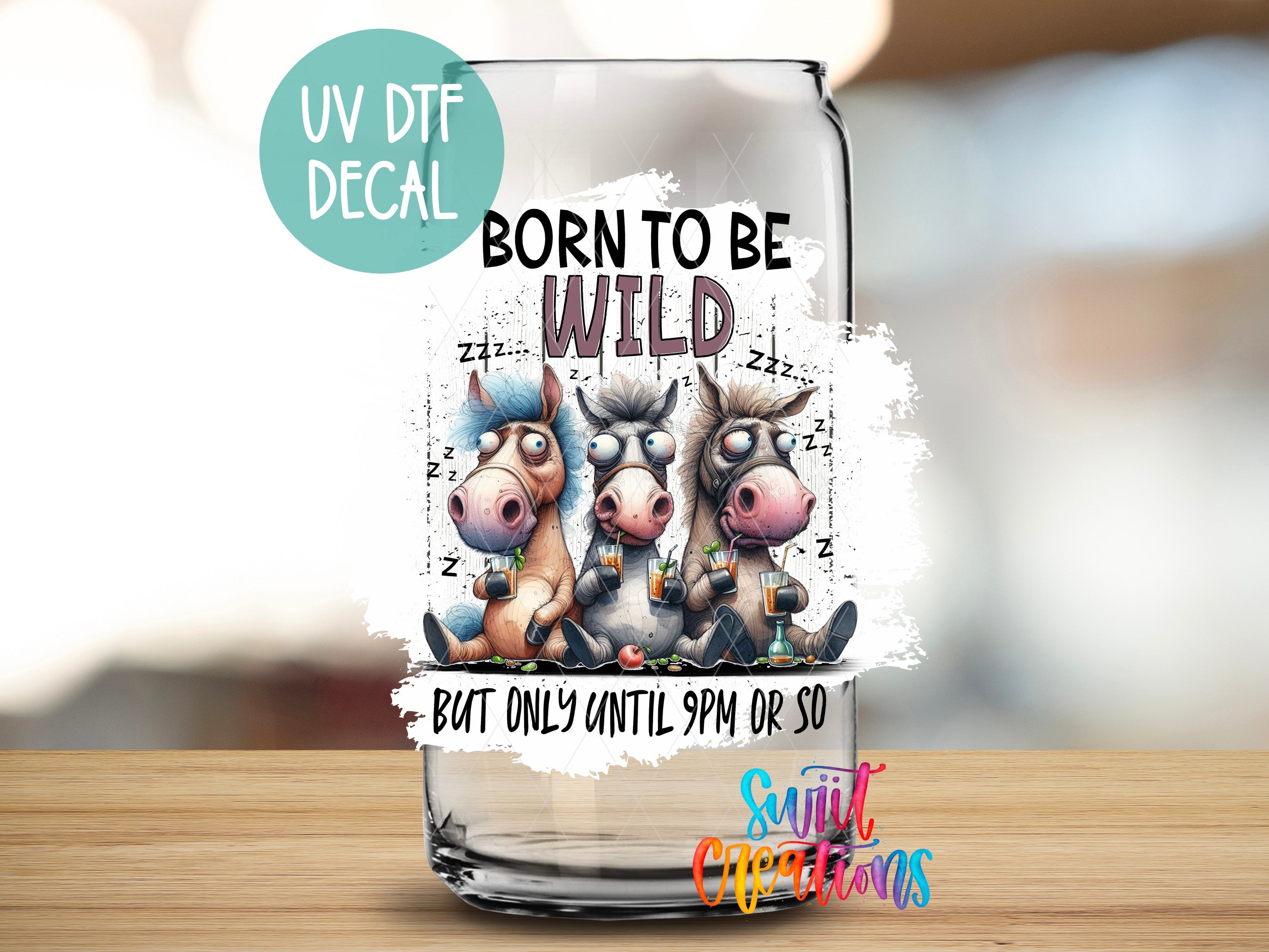 a glass with a picture of three cows on it