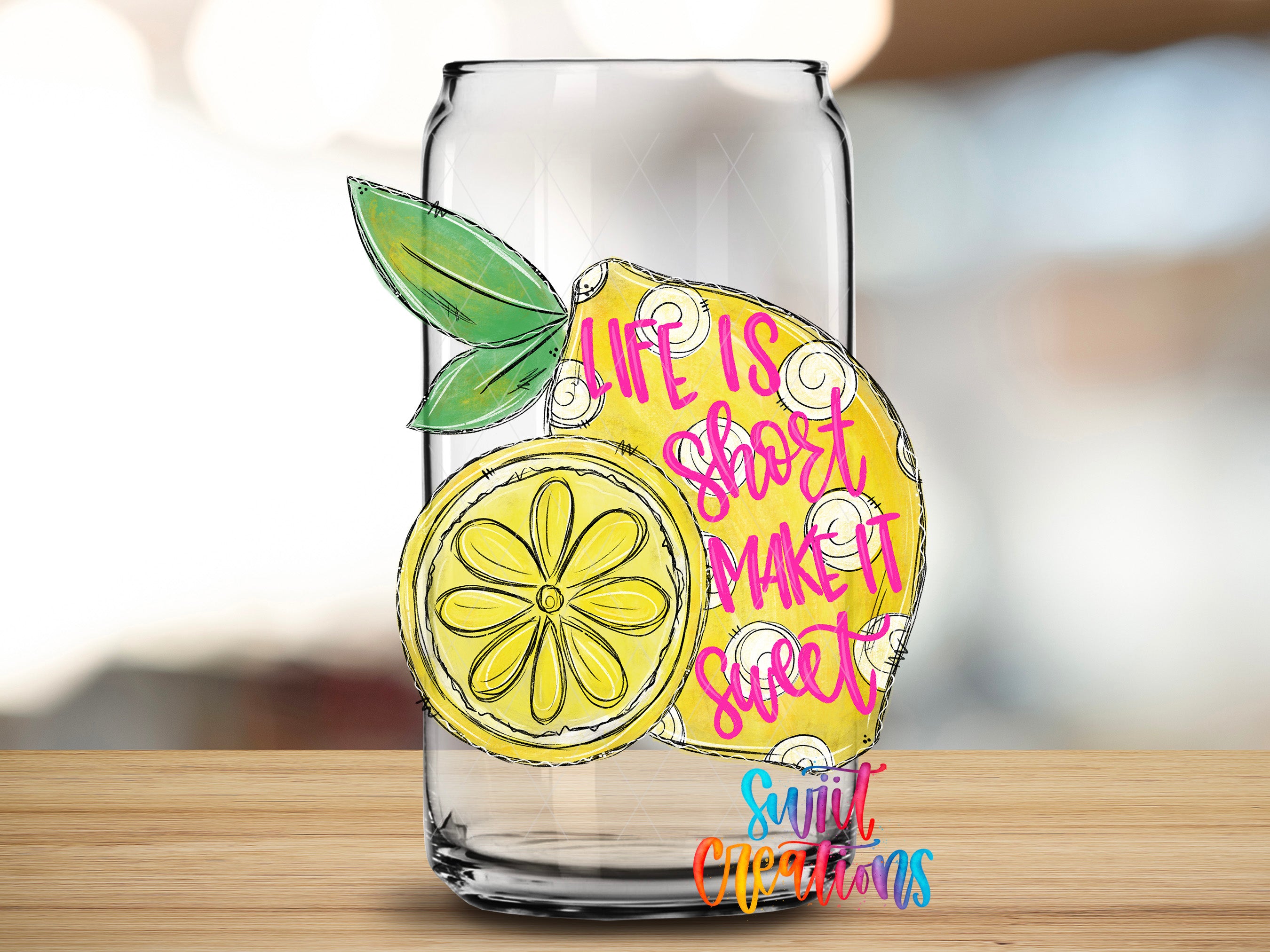 A glass can with a lemon slice and a flower design, along with the text "Life is short, make it sweet" and "Sugar Coated" written on it.