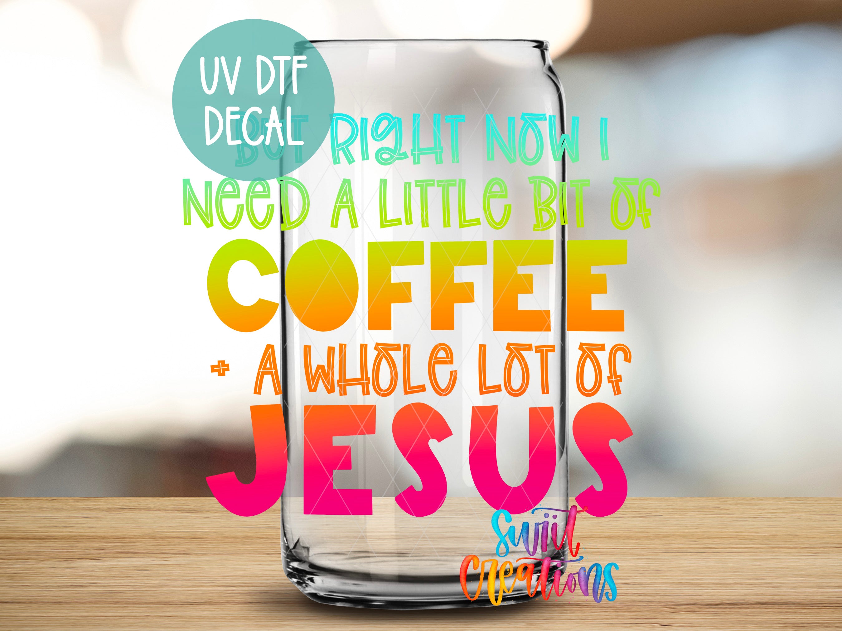 a glass with a quote on it sitting on a table