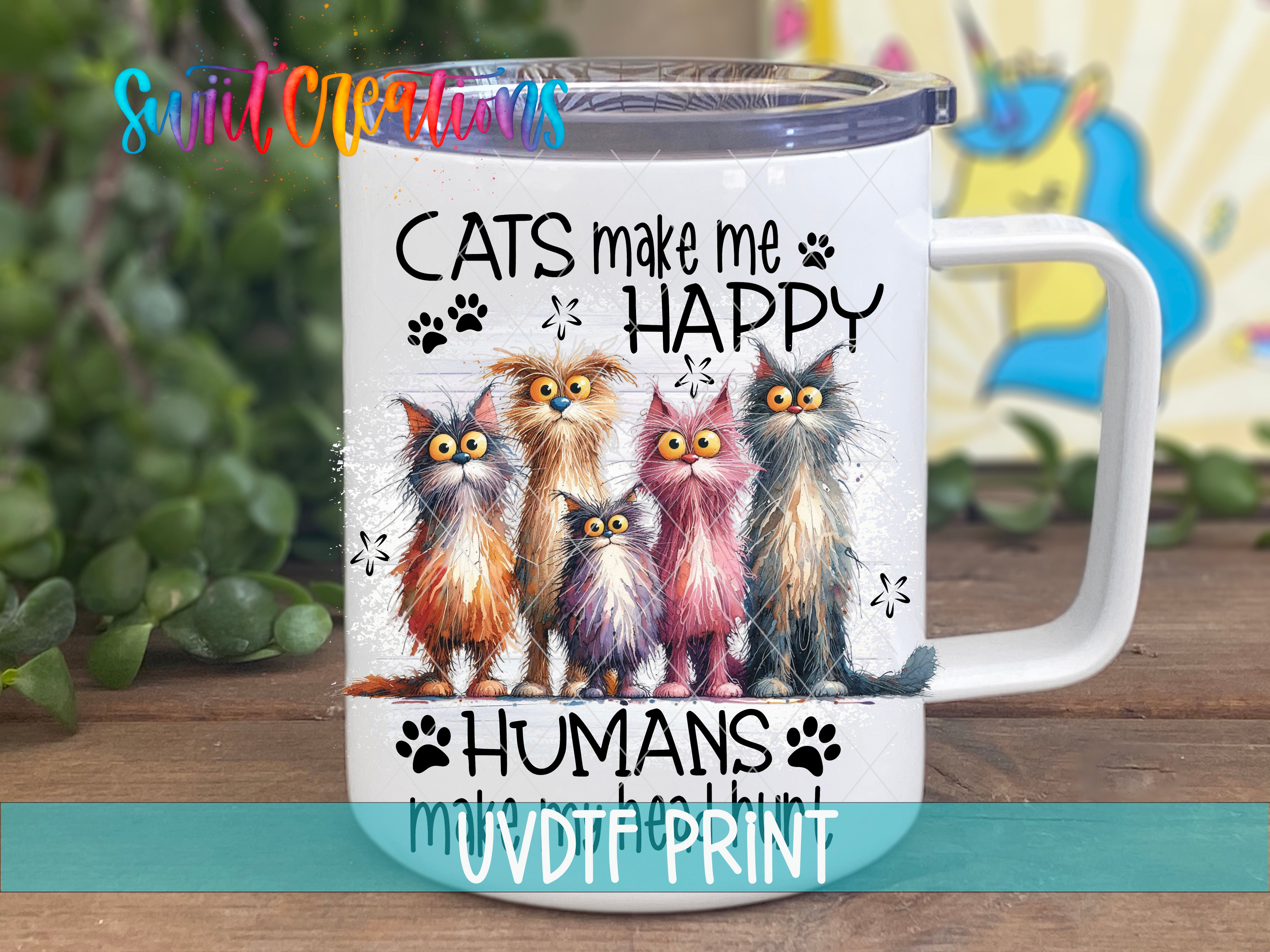 A white mug with a printed design featuring a group of cats and the text "CATS make me HAPPY humans my UVD print".