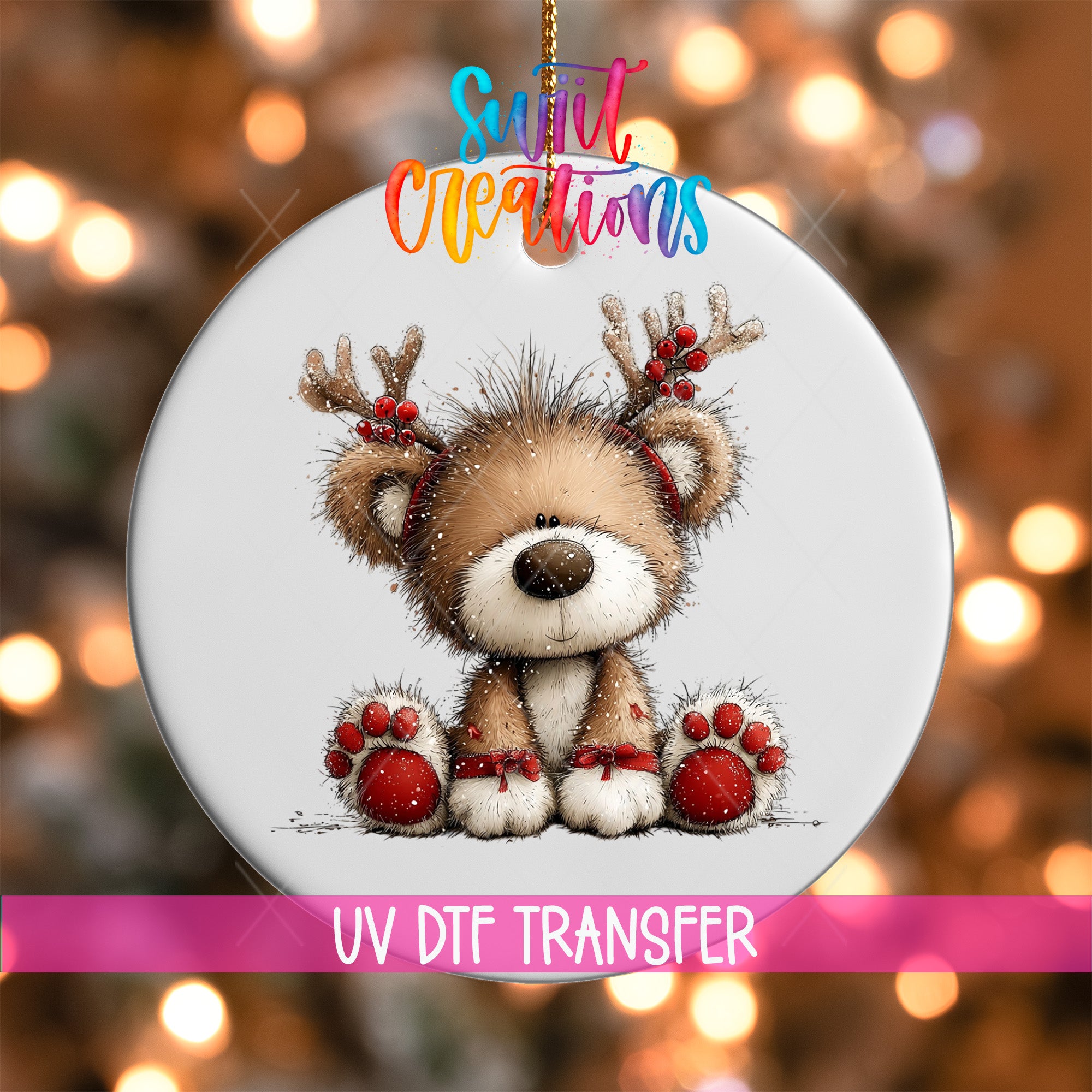 A white ornament with a cute brown bear wearing antlers and red paws, with a colorful background and text overlay.