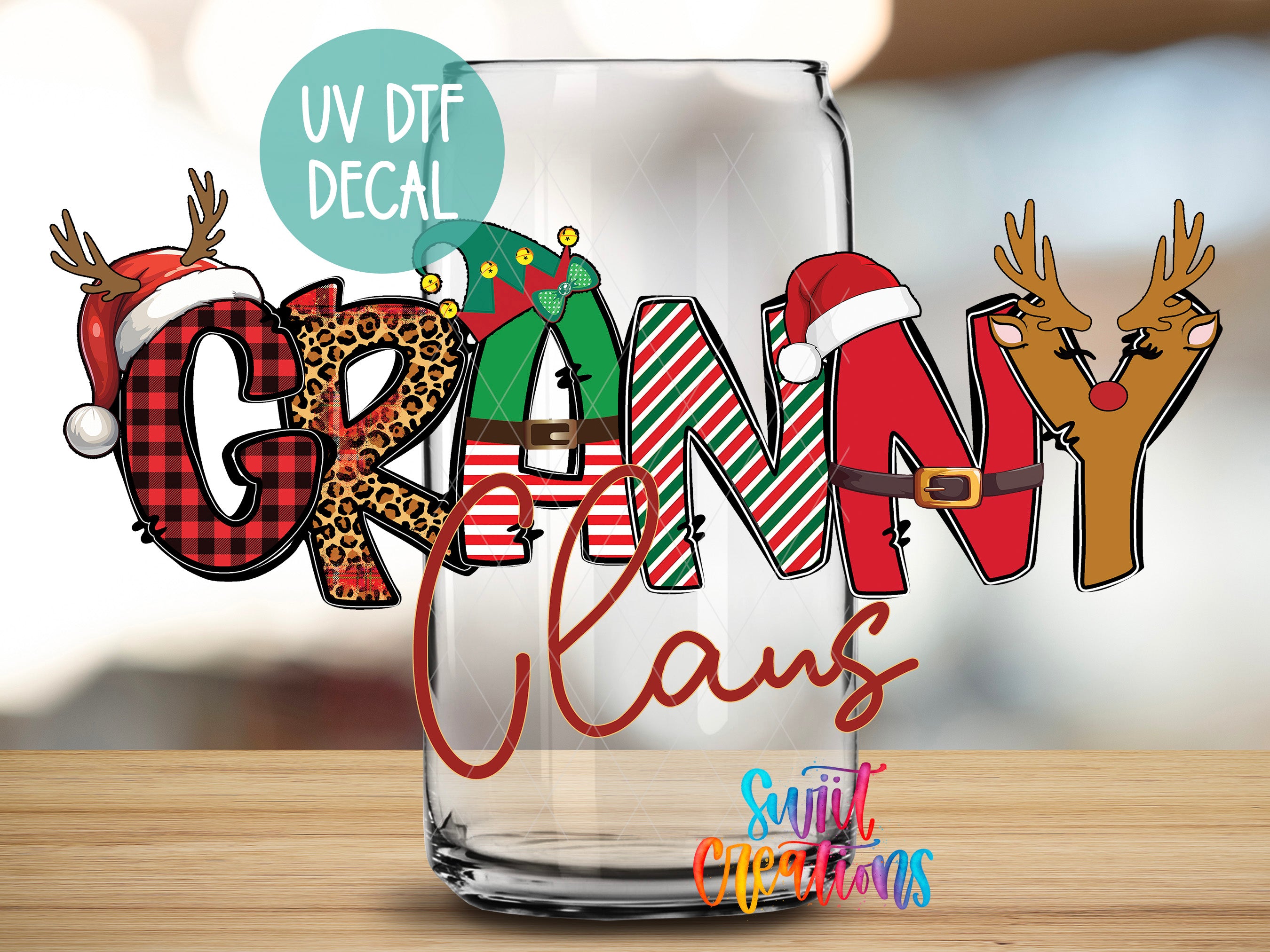 a glass with some christmas decorations on it