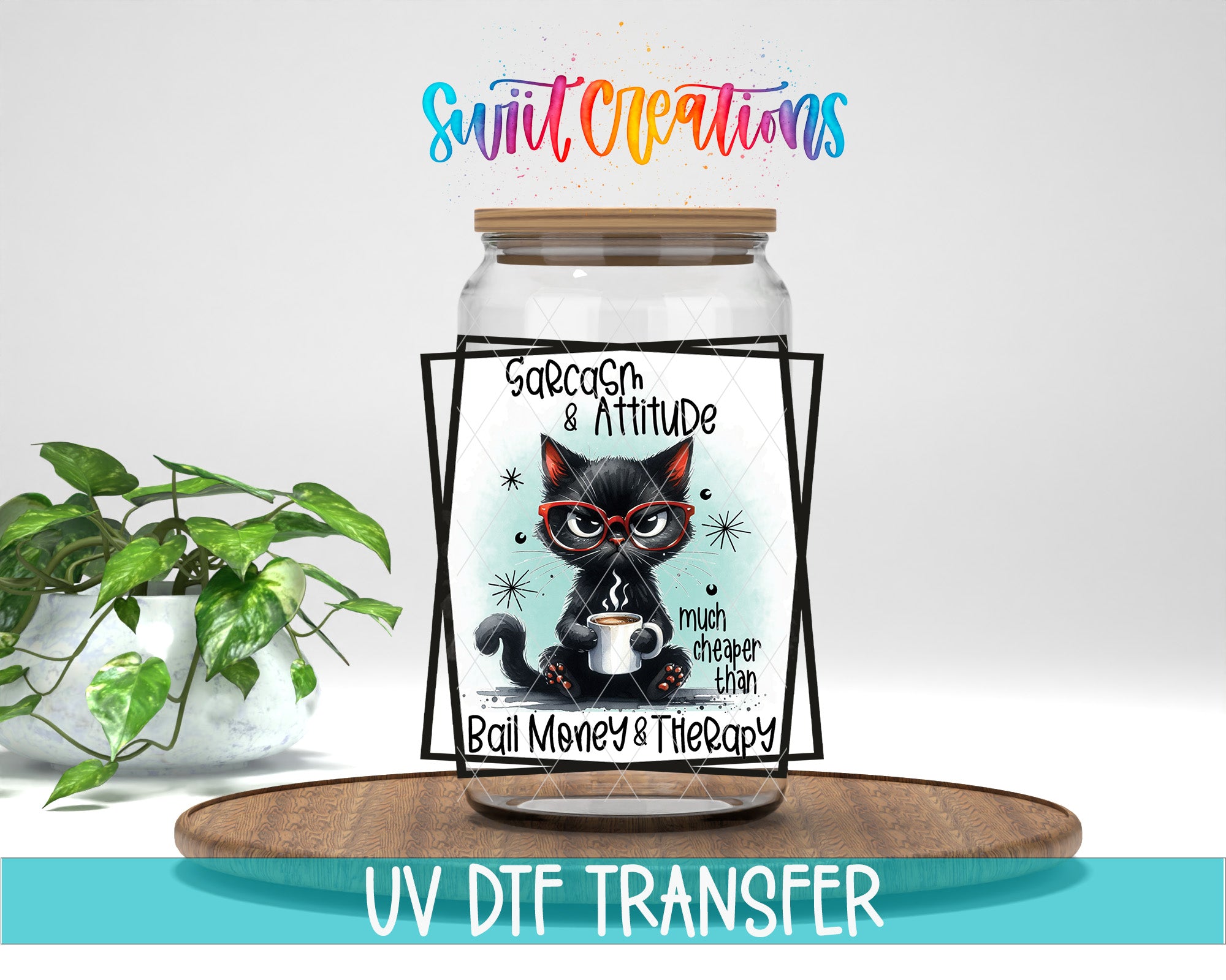 A jar with a cat illustration and text, placed on a wooden surface next to a potted plant.