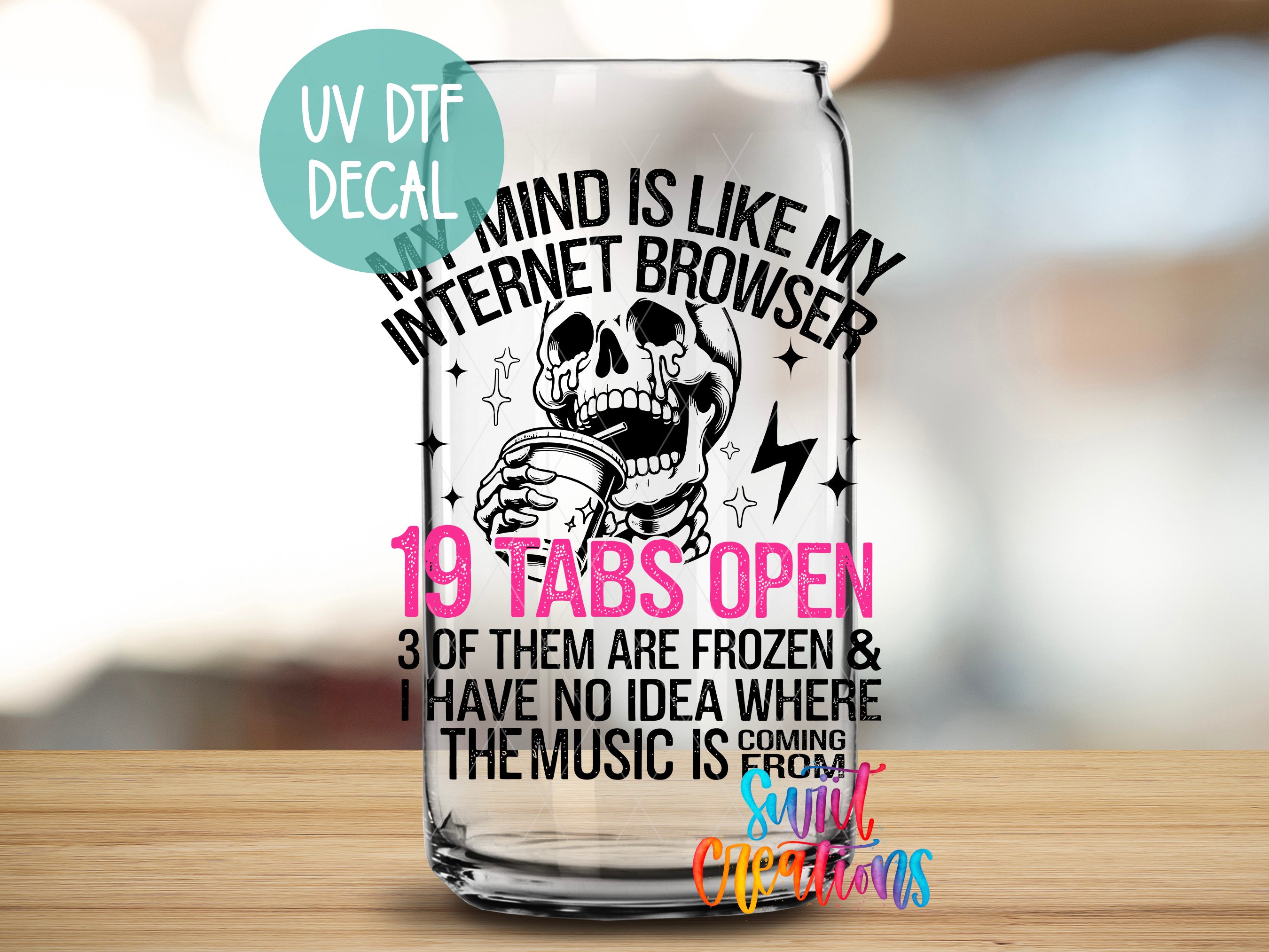 a glass with a picture of a skull on it