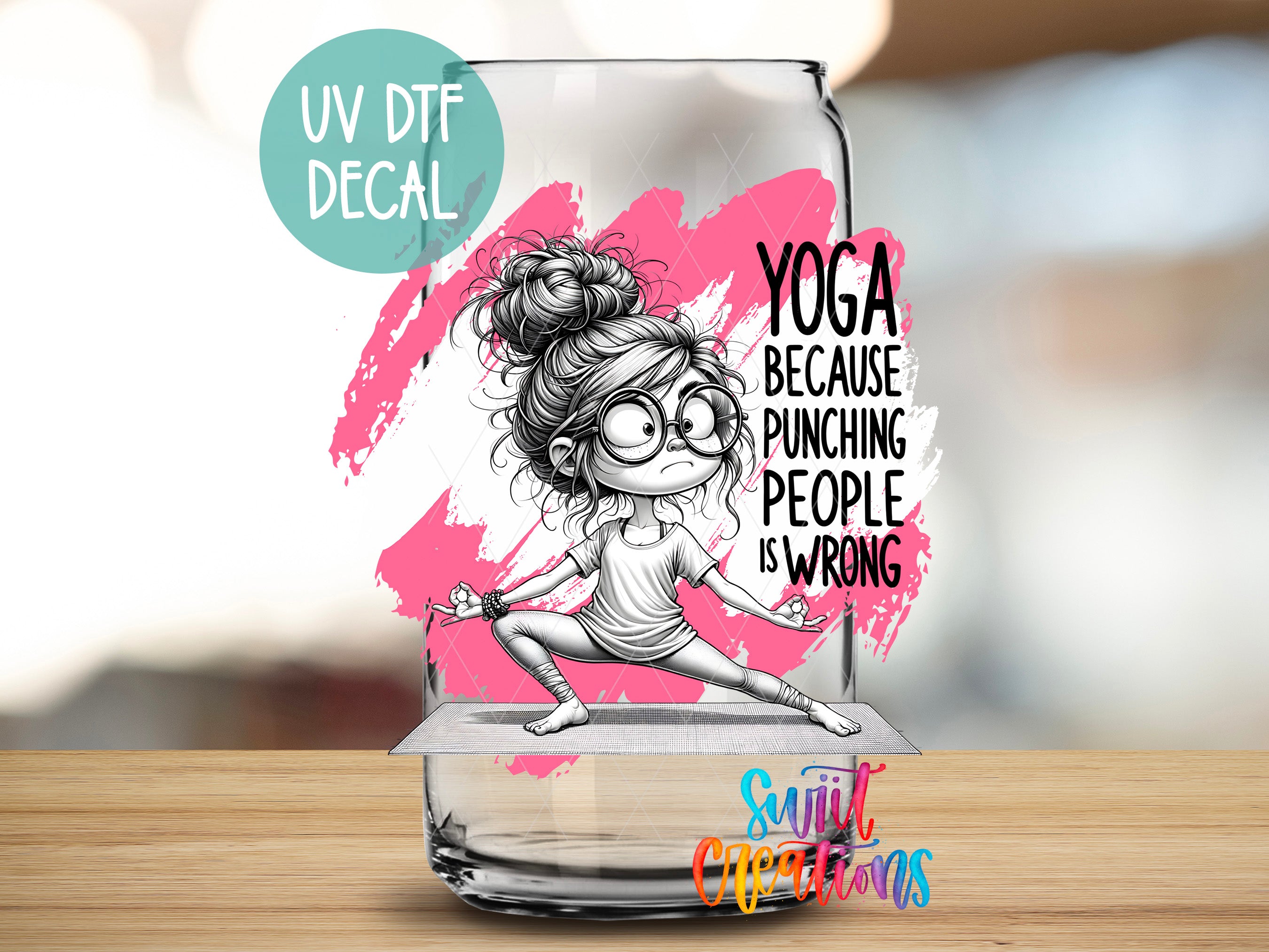 a glass with a picture of a woman doing yoga