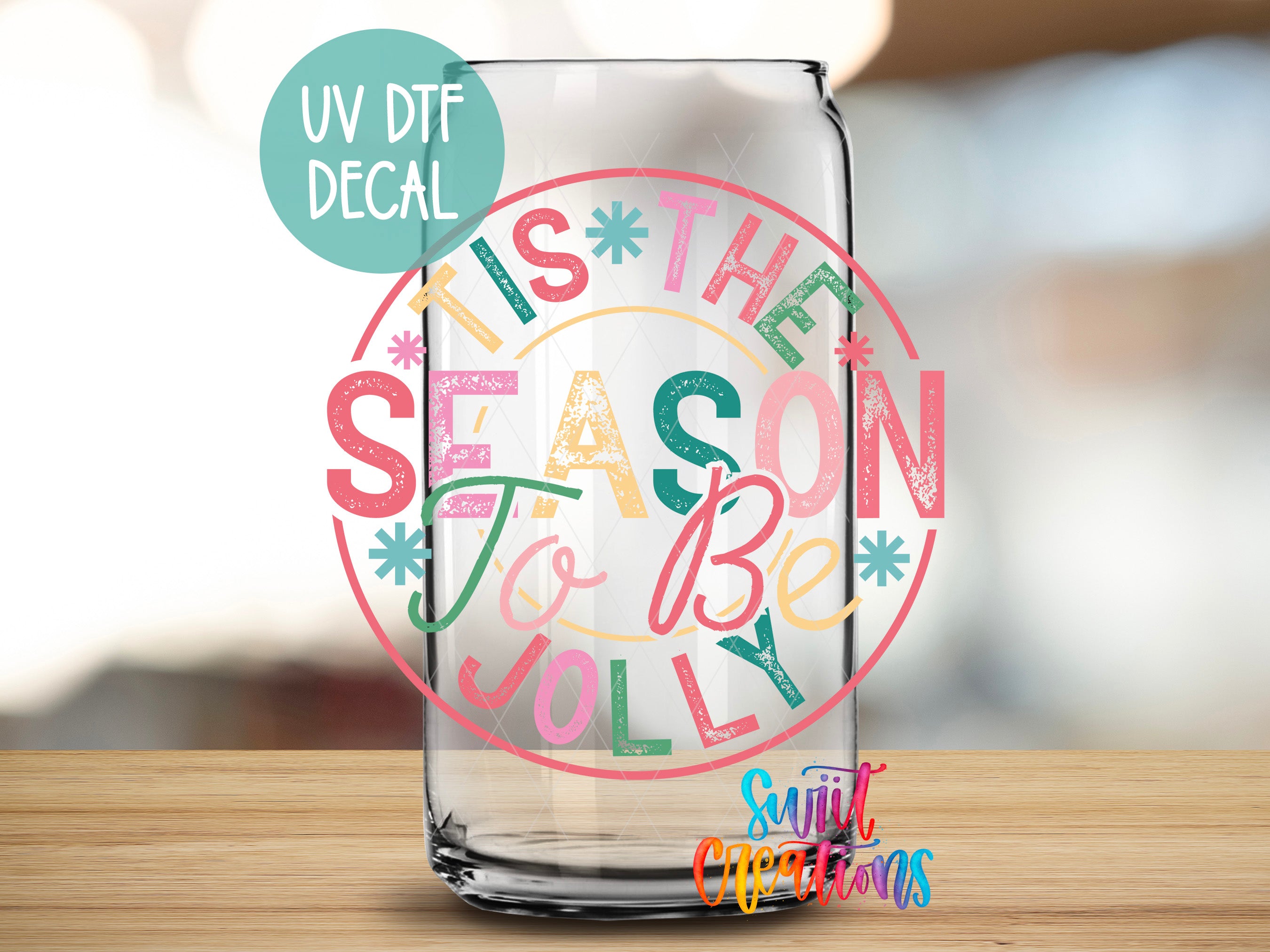 a glass with the words tis the season and holiday written on it