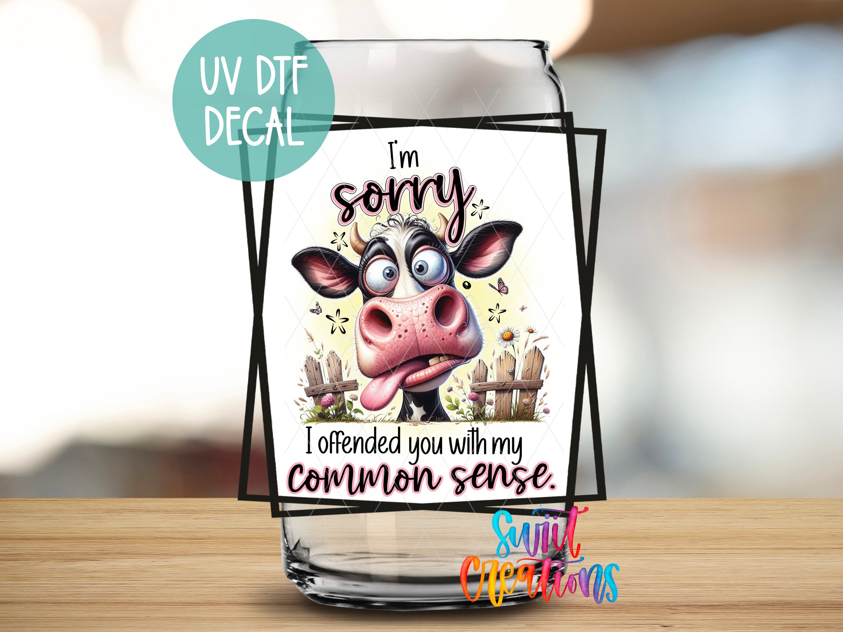 a glass with a picture of a cow on it