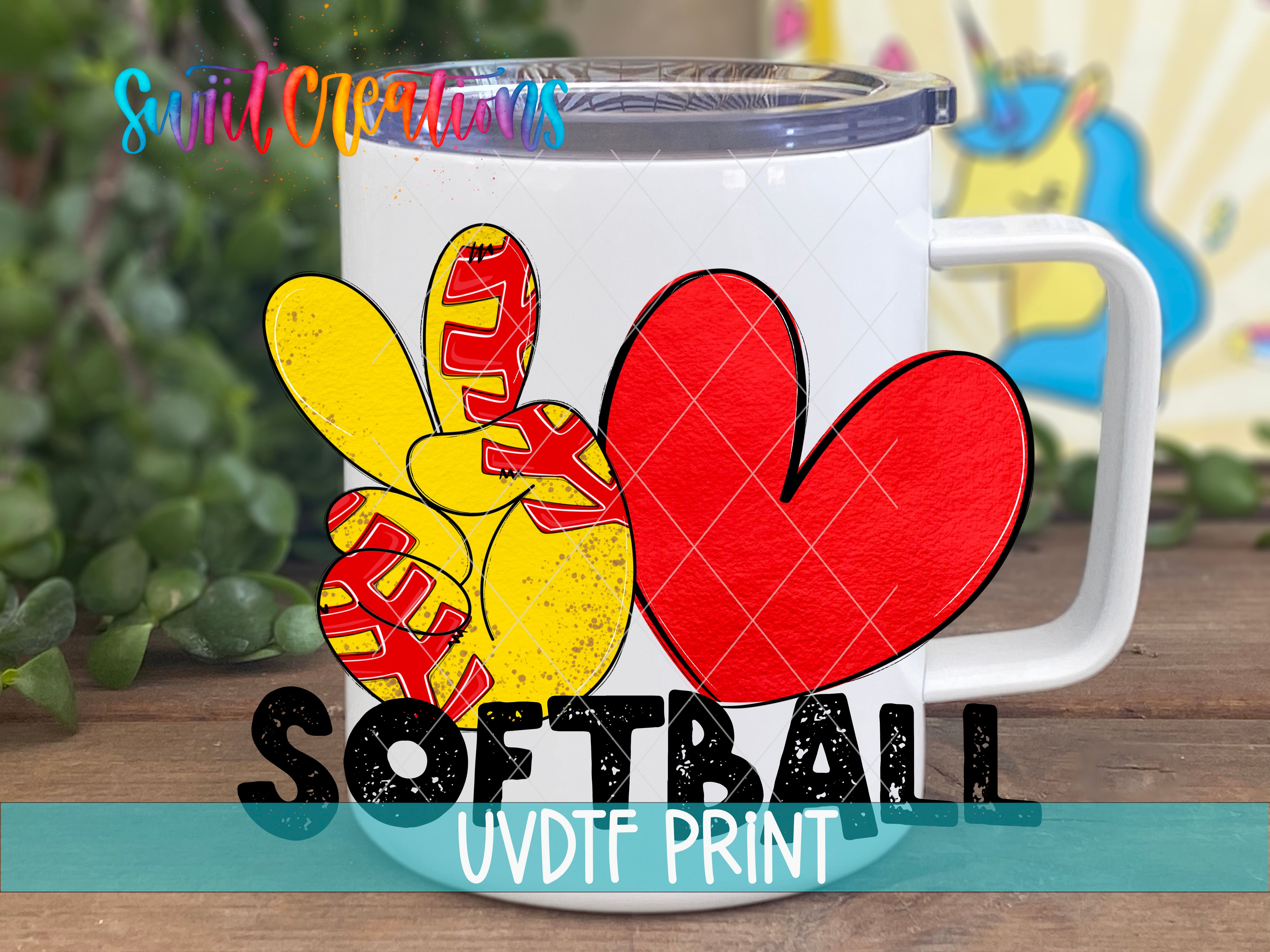 A white mug with a peace sign and a red heart design, along with the text "SOFTBALL UVDF PRINT" printed on it.