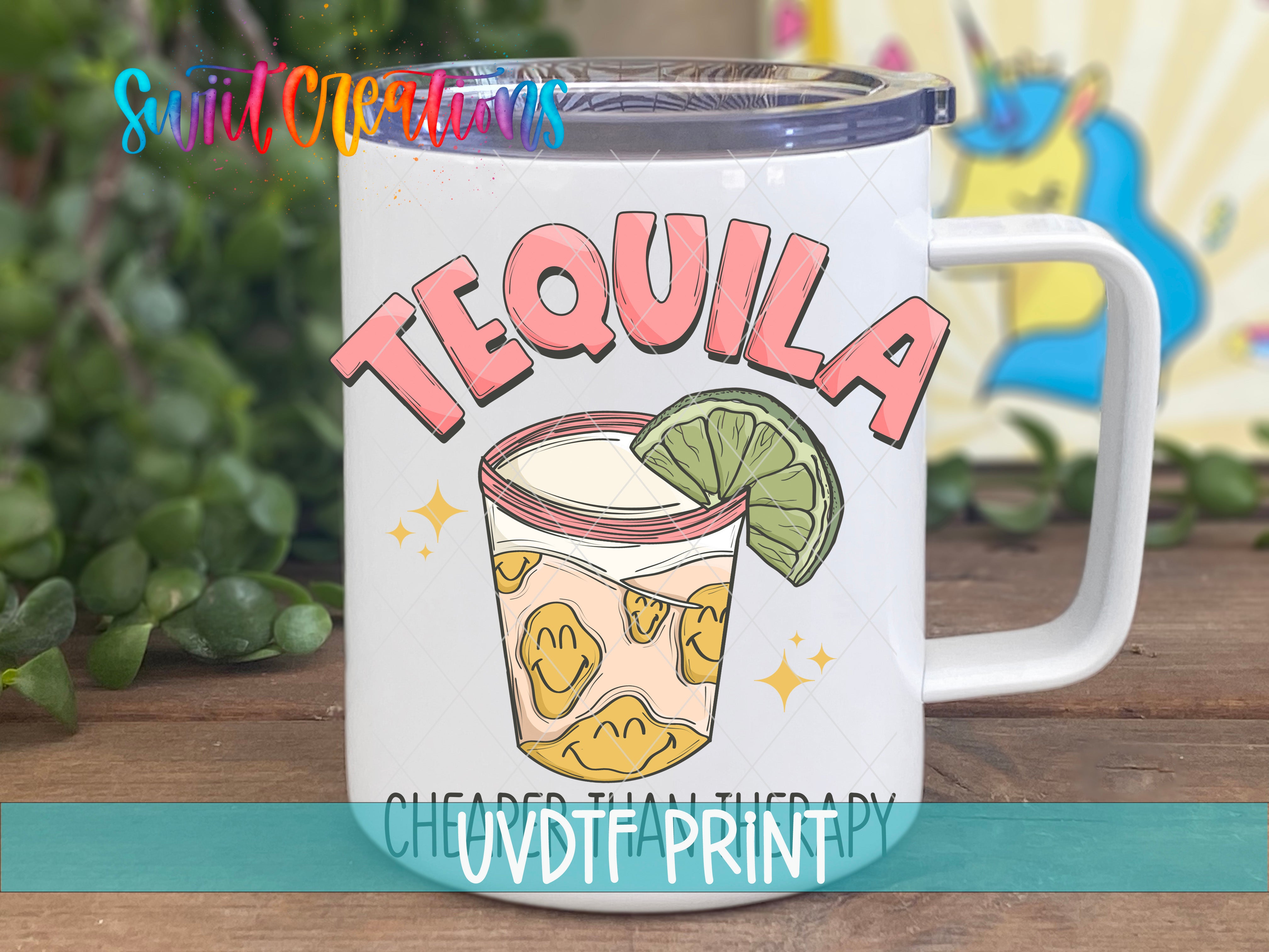A white mug with a colorful design featuring a tequila glass and a lime slice, along with the text "Tequila" and "Cheased than therapy" printed on it.