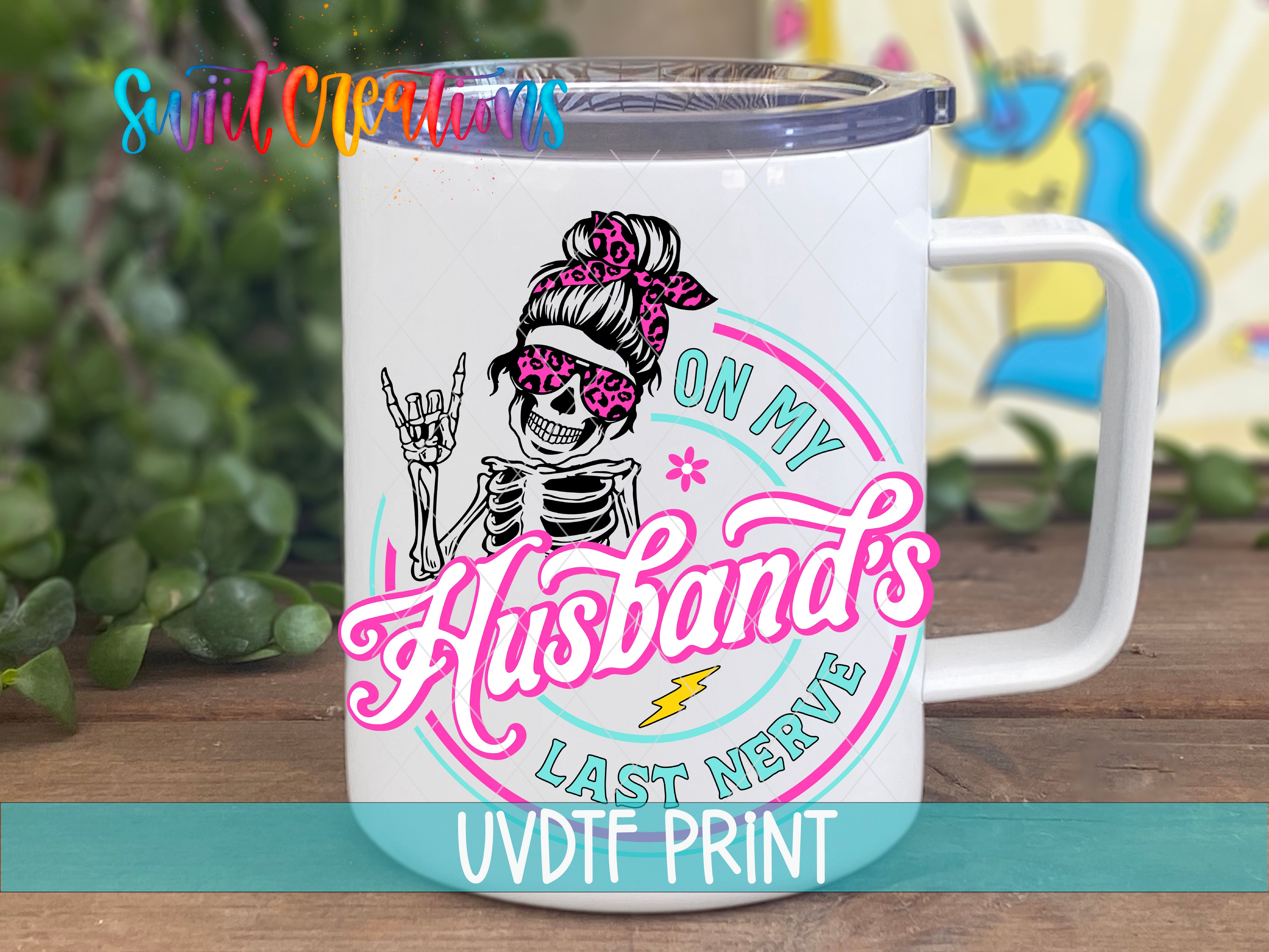 A white mug with a colorful graphic design featuring a skeleton wearing sunglasses and holding a guitar, along with the text "On My Husband's Last Nerve" printed on it.