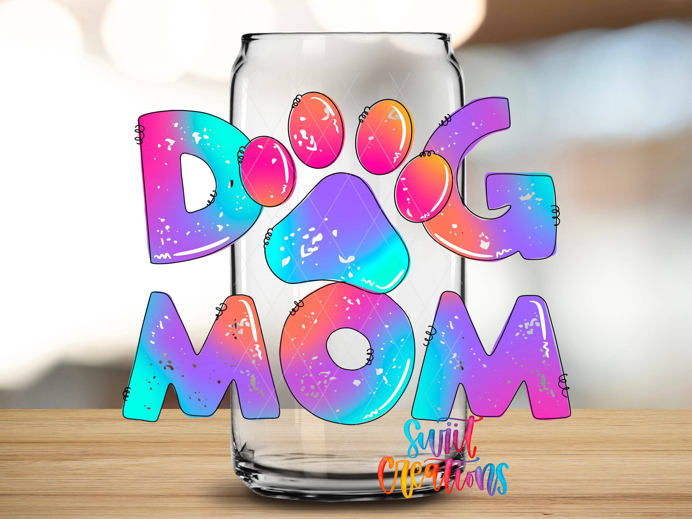 A glass jar with colorful letters spelling out "DOG MOM" in a vibrant, playful style.