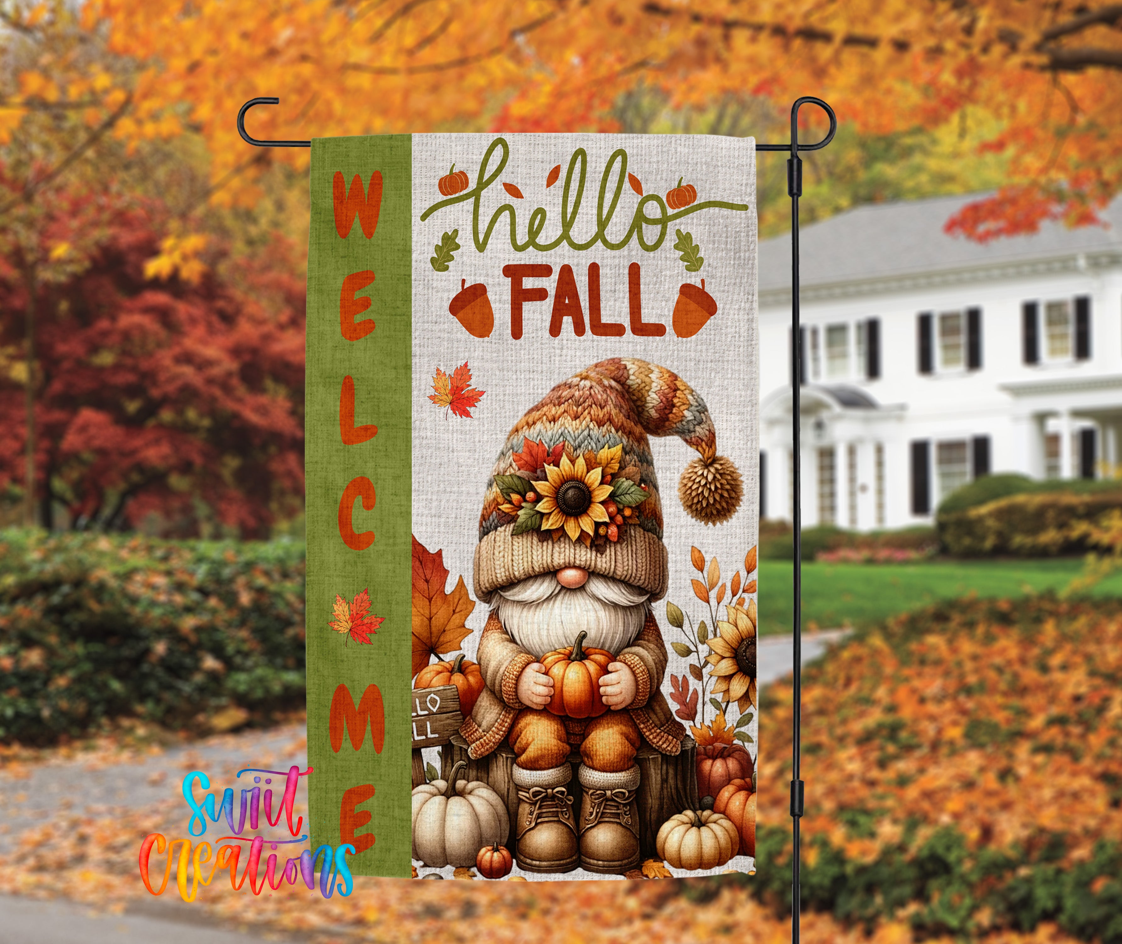 A colorful autumn-themed garden sign featuring a gnome holding pumpkins and surrounded by fall decorations.
