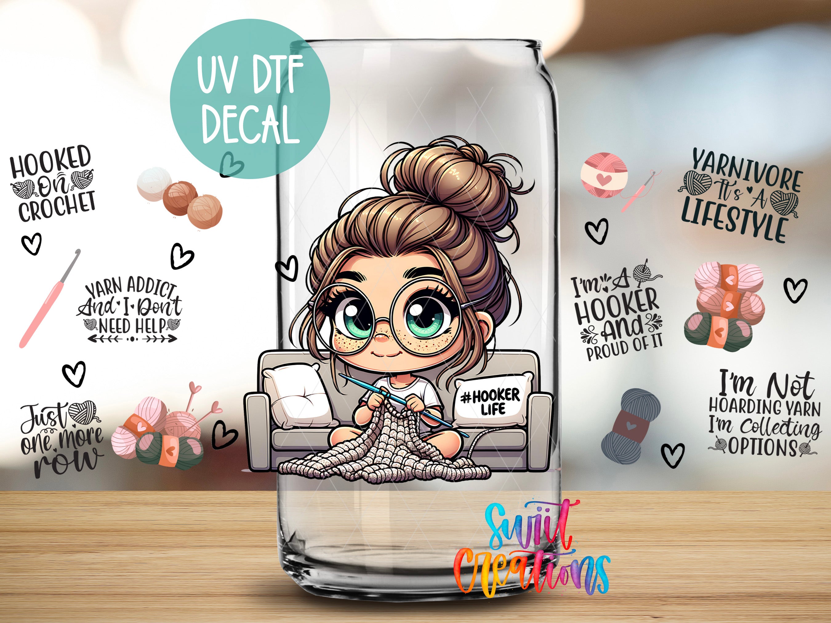 a glass with a cartoon illustration of a woman sitting on a couch, knitting a scarf. The glass has various stickers and text related to crochet and knitting, such as "UV DFT DECAL", "Yarn addiction", "Just one more", "I'm a hooker", "I'm proud of it", "I'm not hoarding yarn", "I'm collecting options", and "I'm not hoarding yarn".