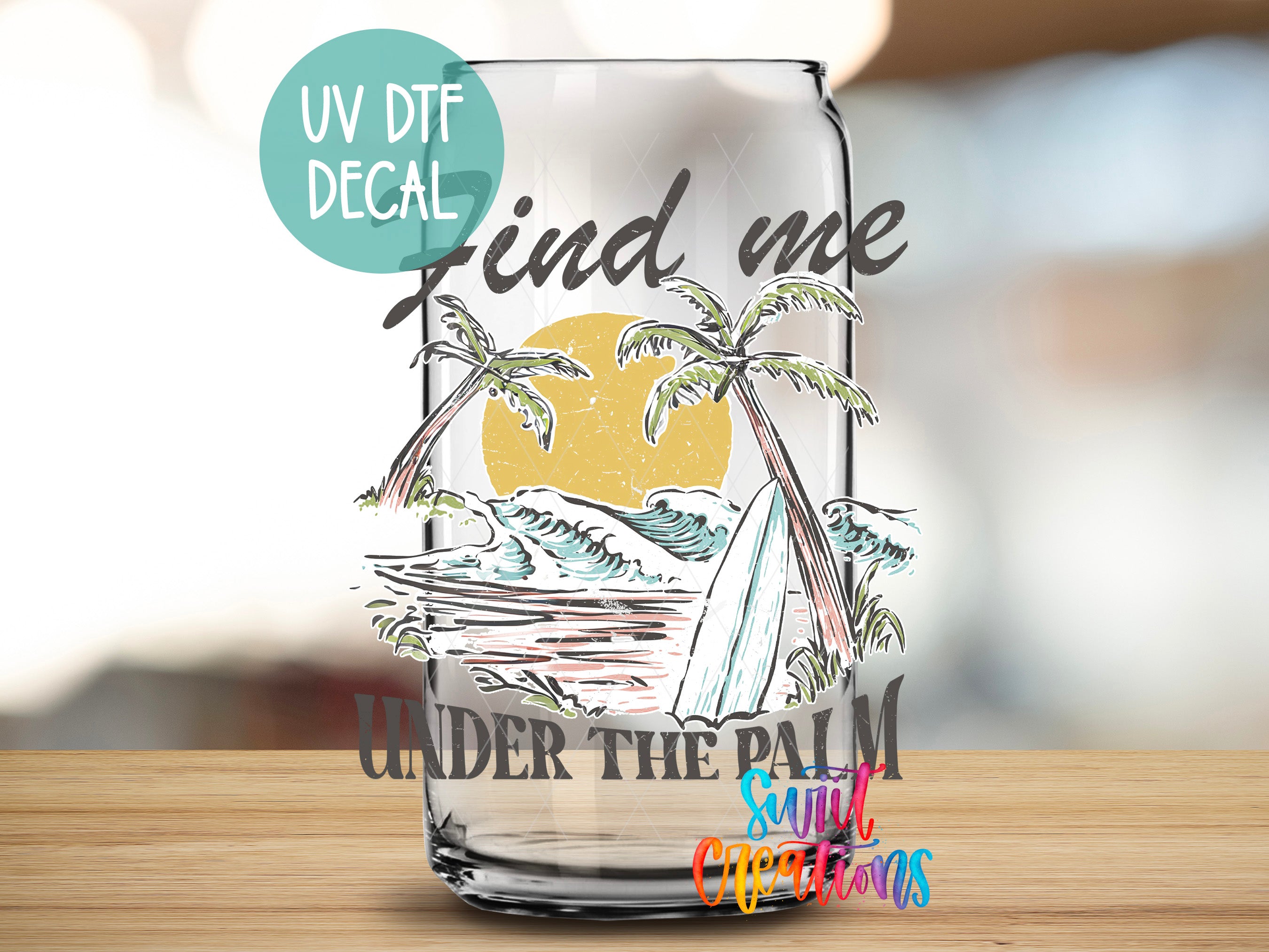 a glass with a picture of a beach and palm trees