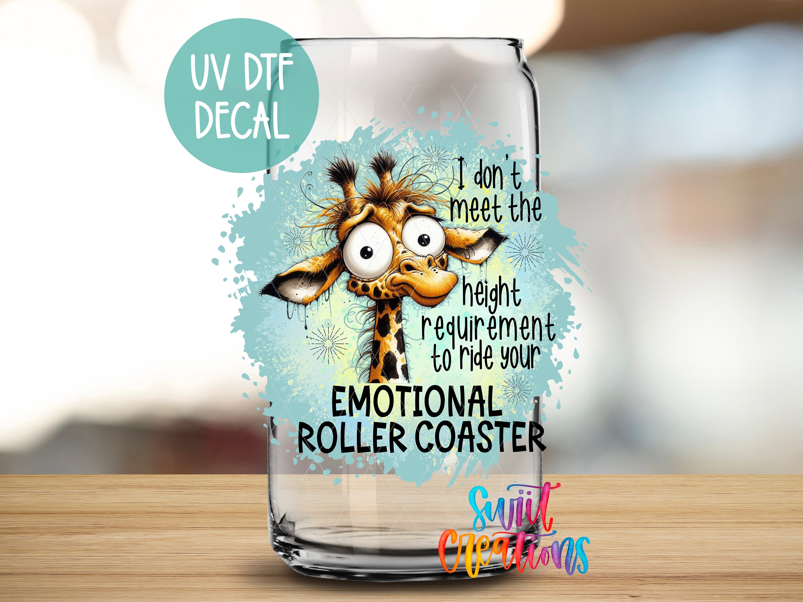 a glass with a picture of a giraffe on it