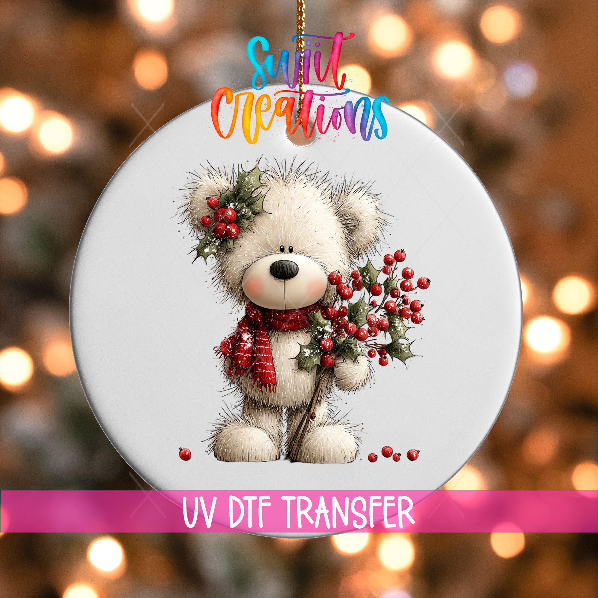 A white teddy bear ornament with a red scarf and berries, hanging against a background of colorful lights.