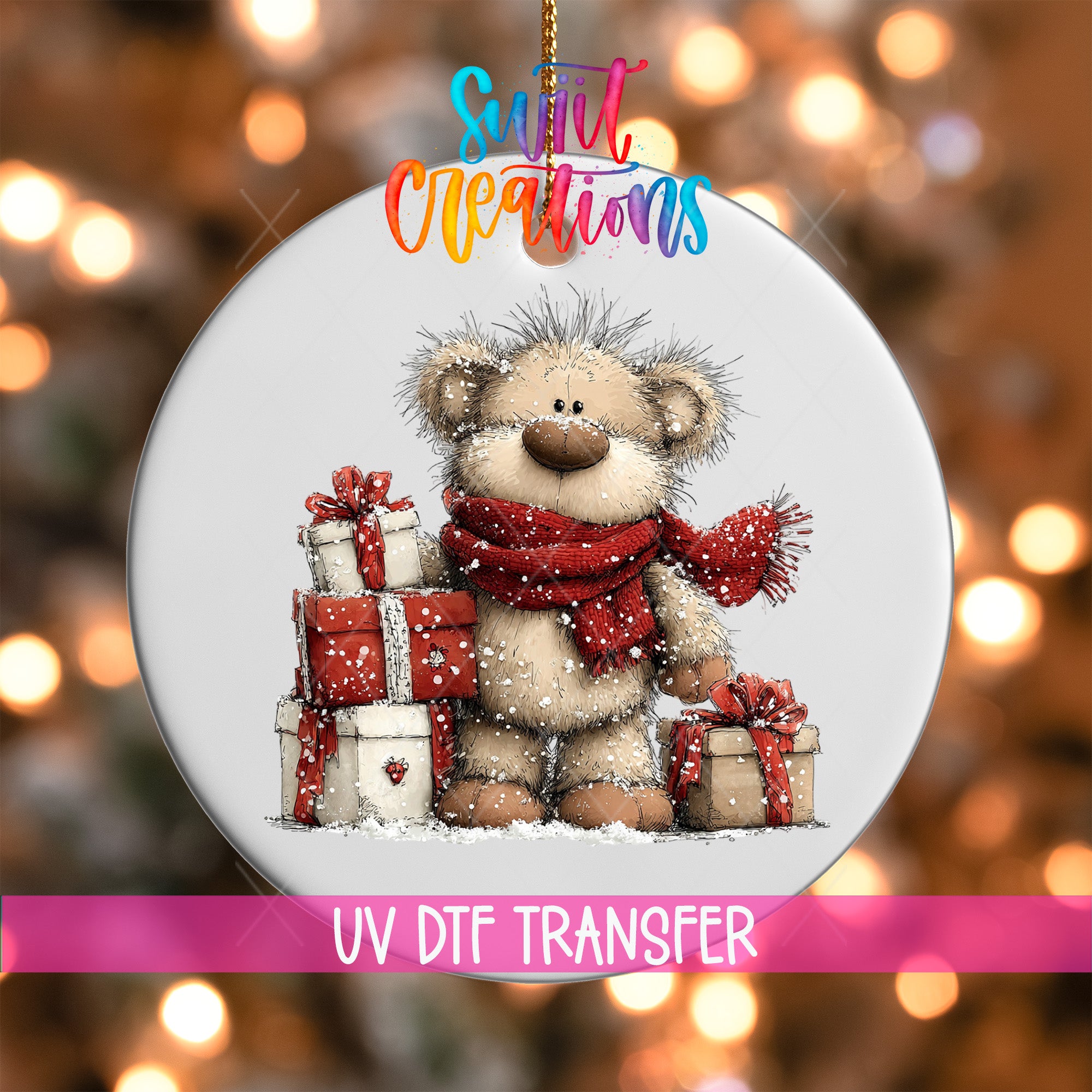 A round ornament featuring a teddy bear holding presents and wearing a red scarf, with a colorful background and text indicating it is a UV DFT transfer.