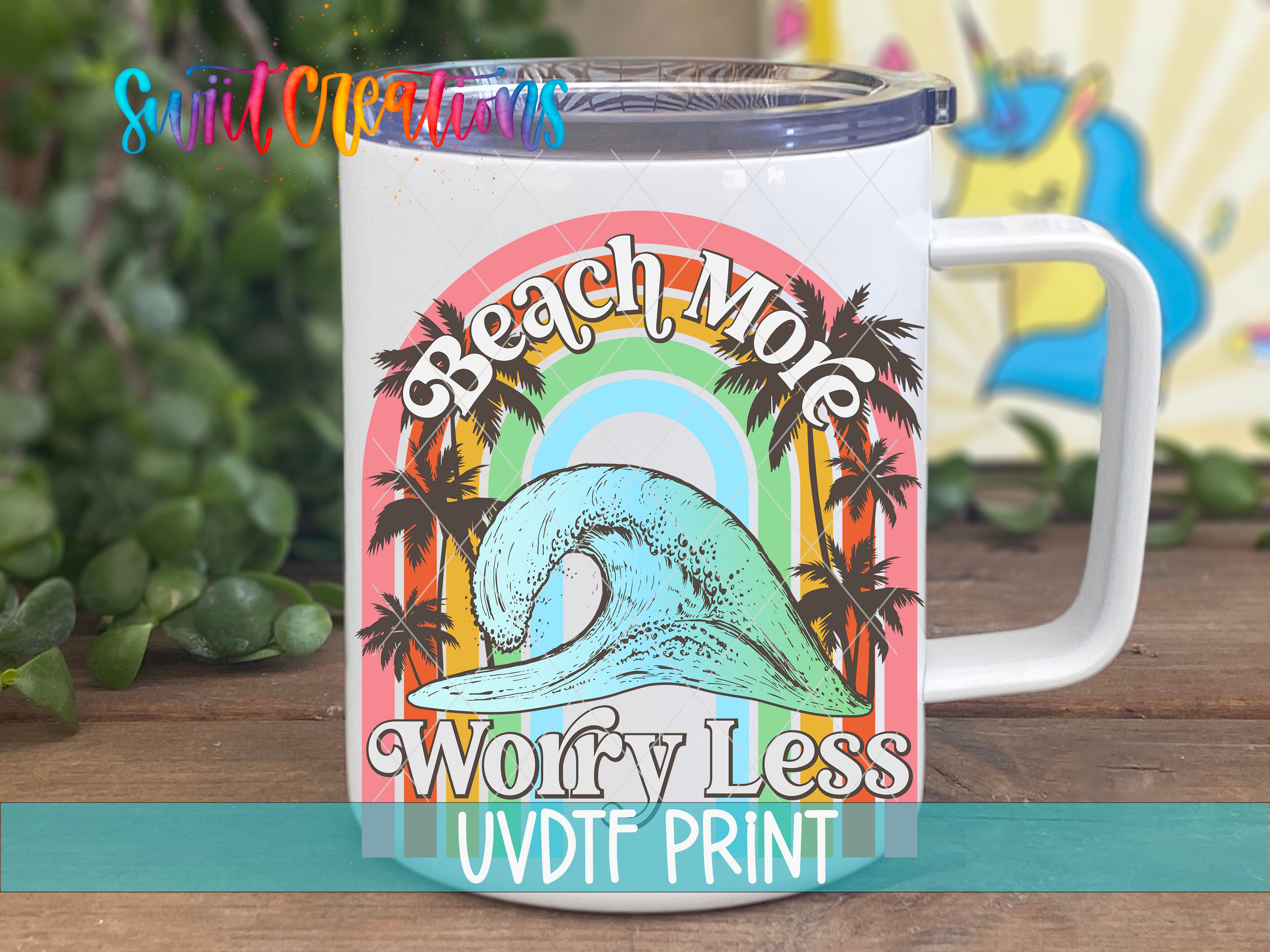 A white mug with a colorful graphic design featuring a wave, palm trees, and a rainbow. The text on the mug reads "Beach Mole Worry Less UVDF PRINT".