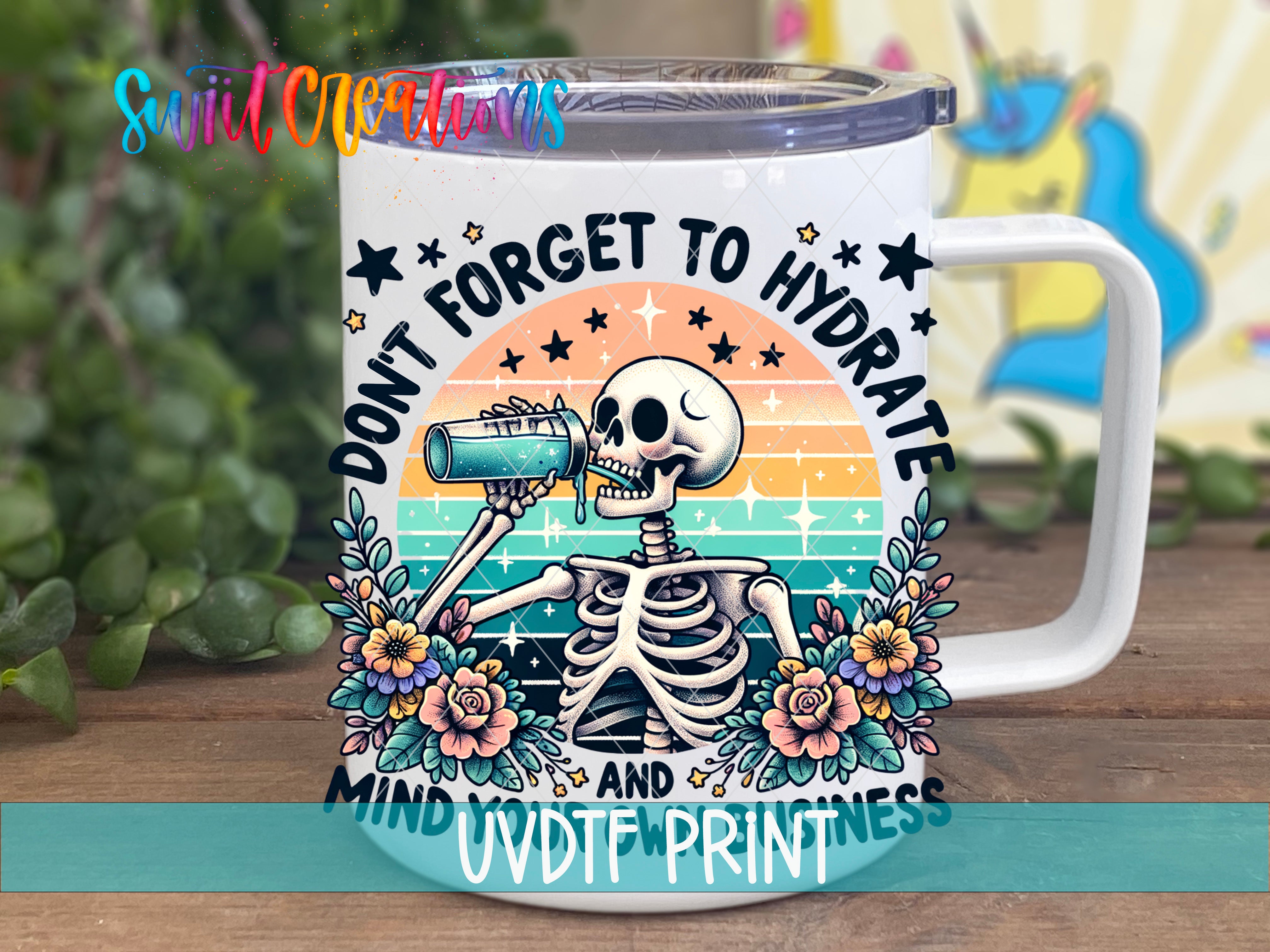 A mug with a skeleton drinking from a cup, surrounded by flowers and stars, with the text "Don't forget to hydrate and mind your business" printed on it.