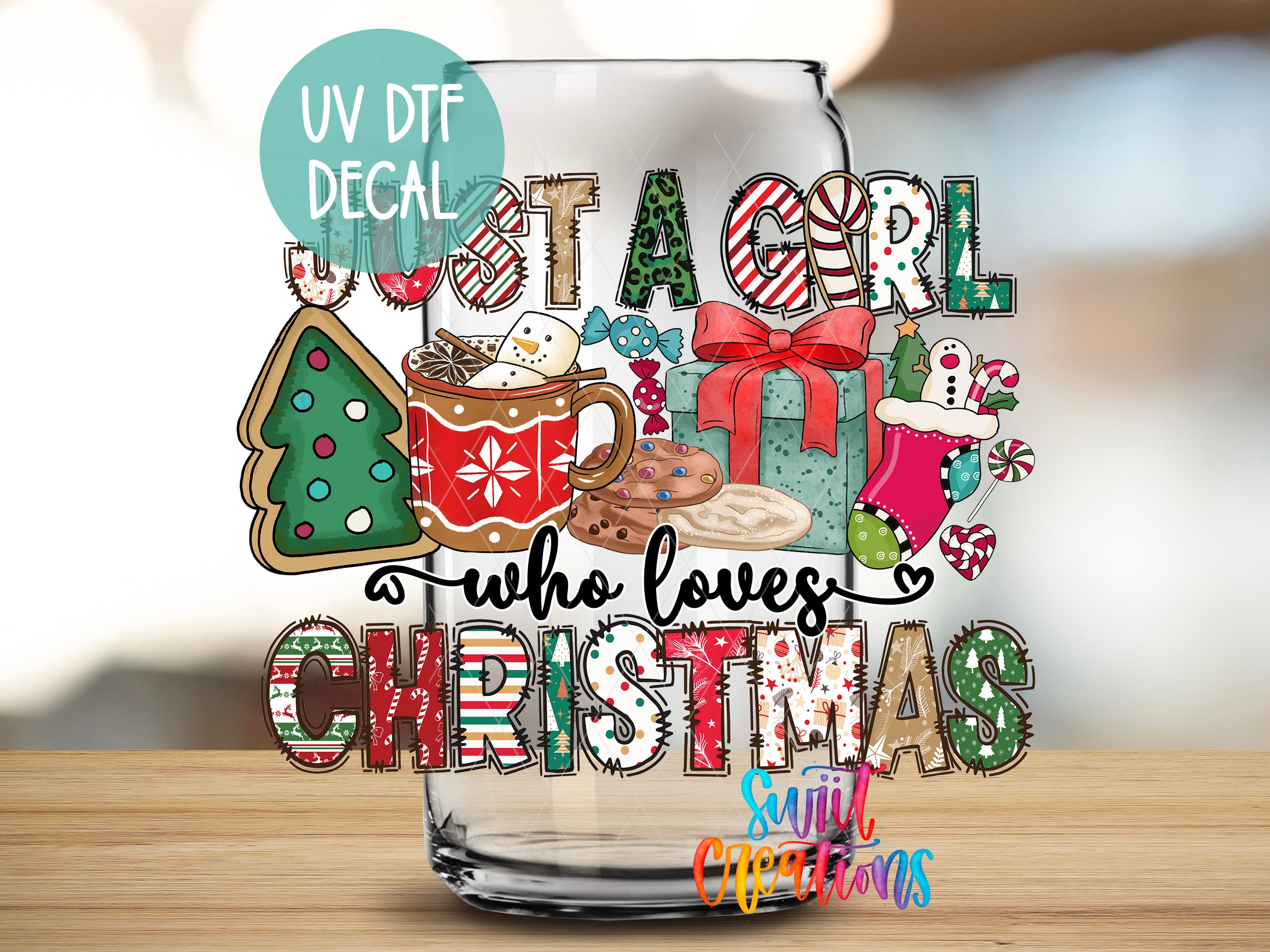 A glass jar with a UV decal that says "Just a Girl Who Loves Christmas" and various Christmas-themed items such as a Christmas tree, cookies, and a gift box.