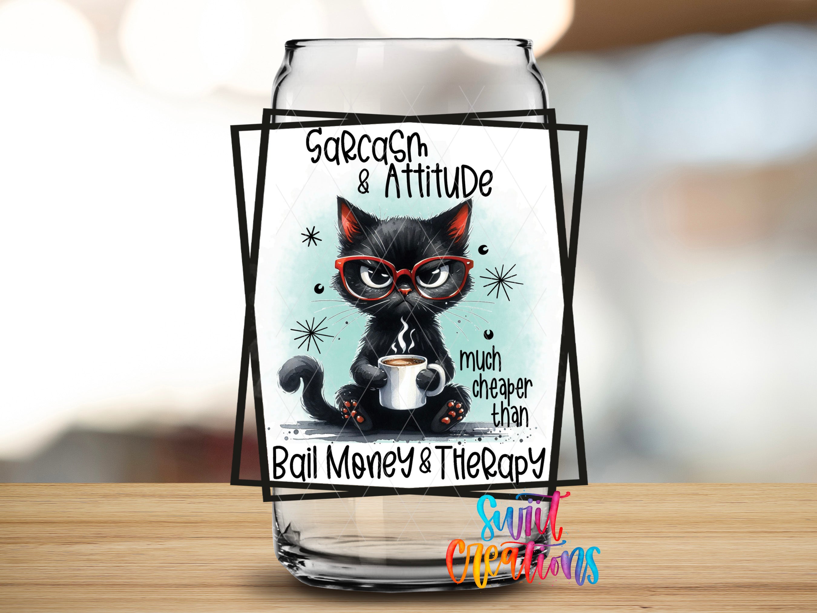 A glass jar with a black cat wearing glasses and holding a coffee mug, accompanied by the text "Sarcasm & Attitude much cheaper than Bail Money & Therapy" and a colorful logo.