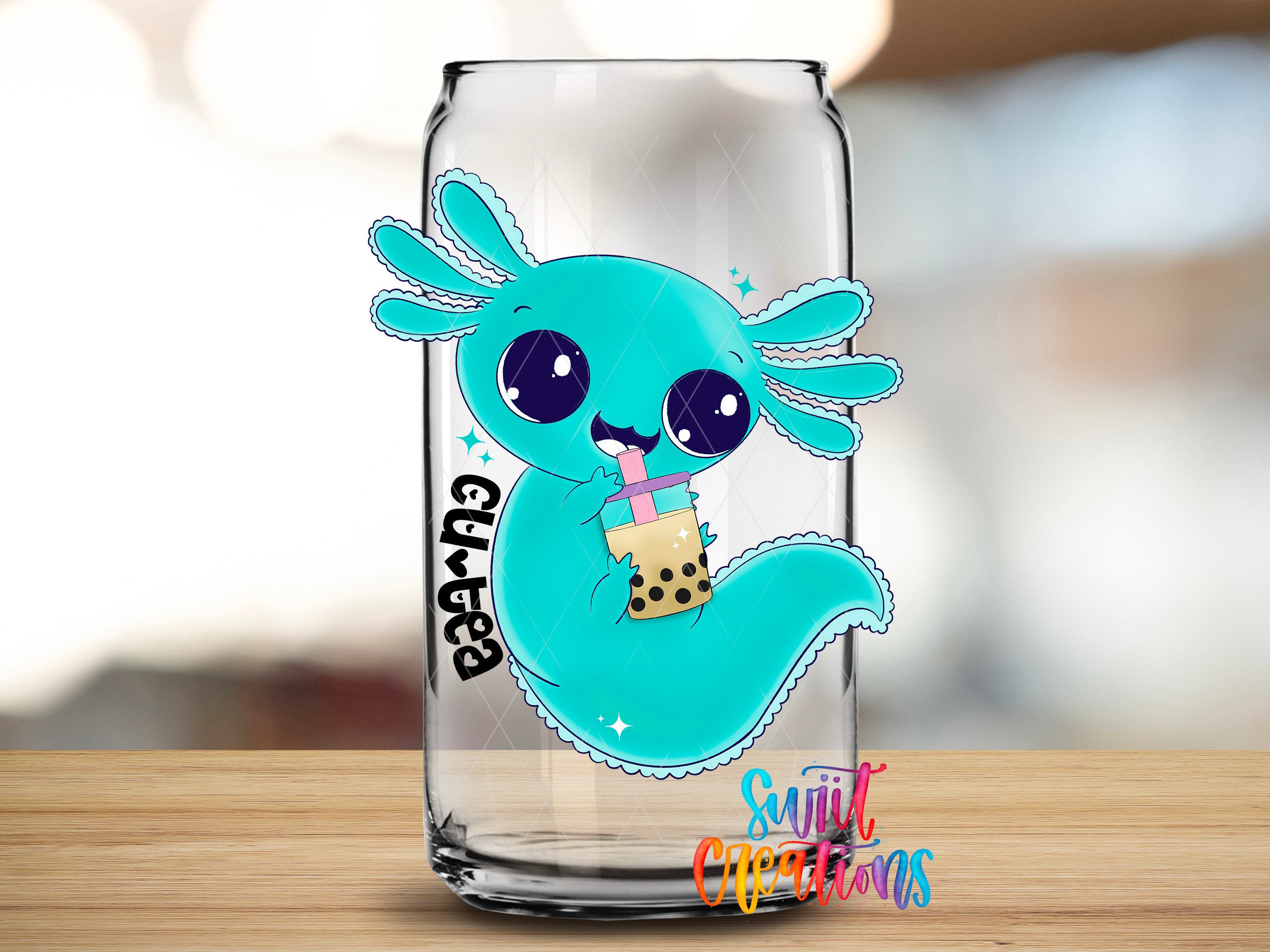 A glass can with a cartoon image of a blue aquatic creature holding a bubble tea drink.
