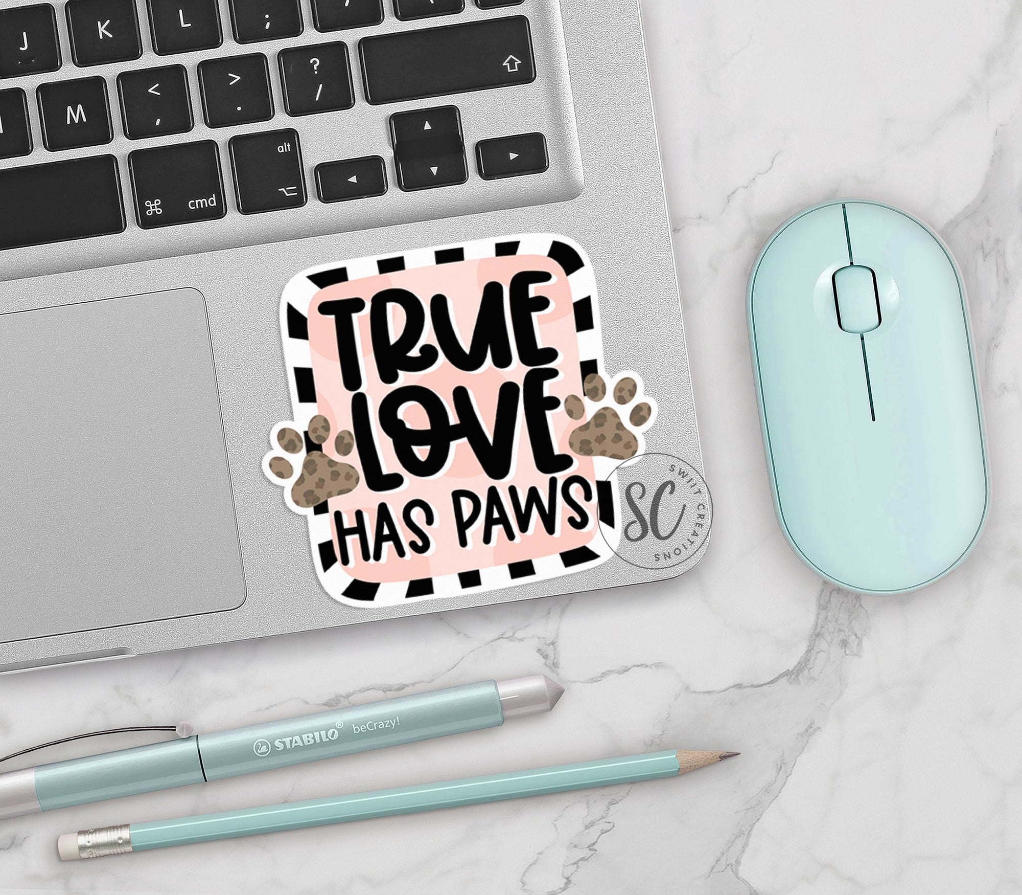 a sticker that says true love has paws on it
