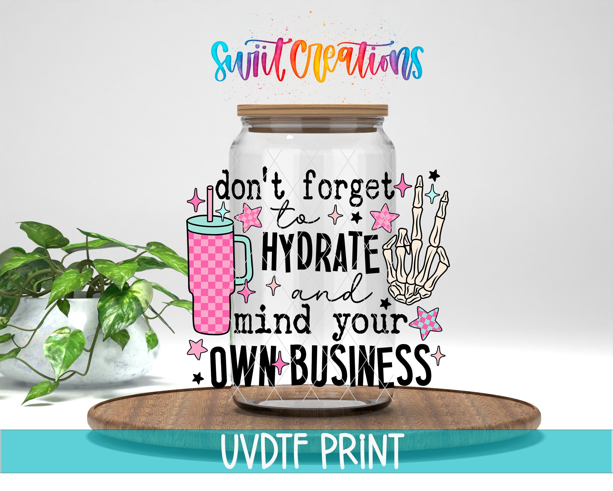 a large glass jar with a colorful and whimsical design, including a skeleton hand, a pink and white checkered mug, and various stars and lines. The text on the jar reads "don't forget to hydrate and mind your own business".