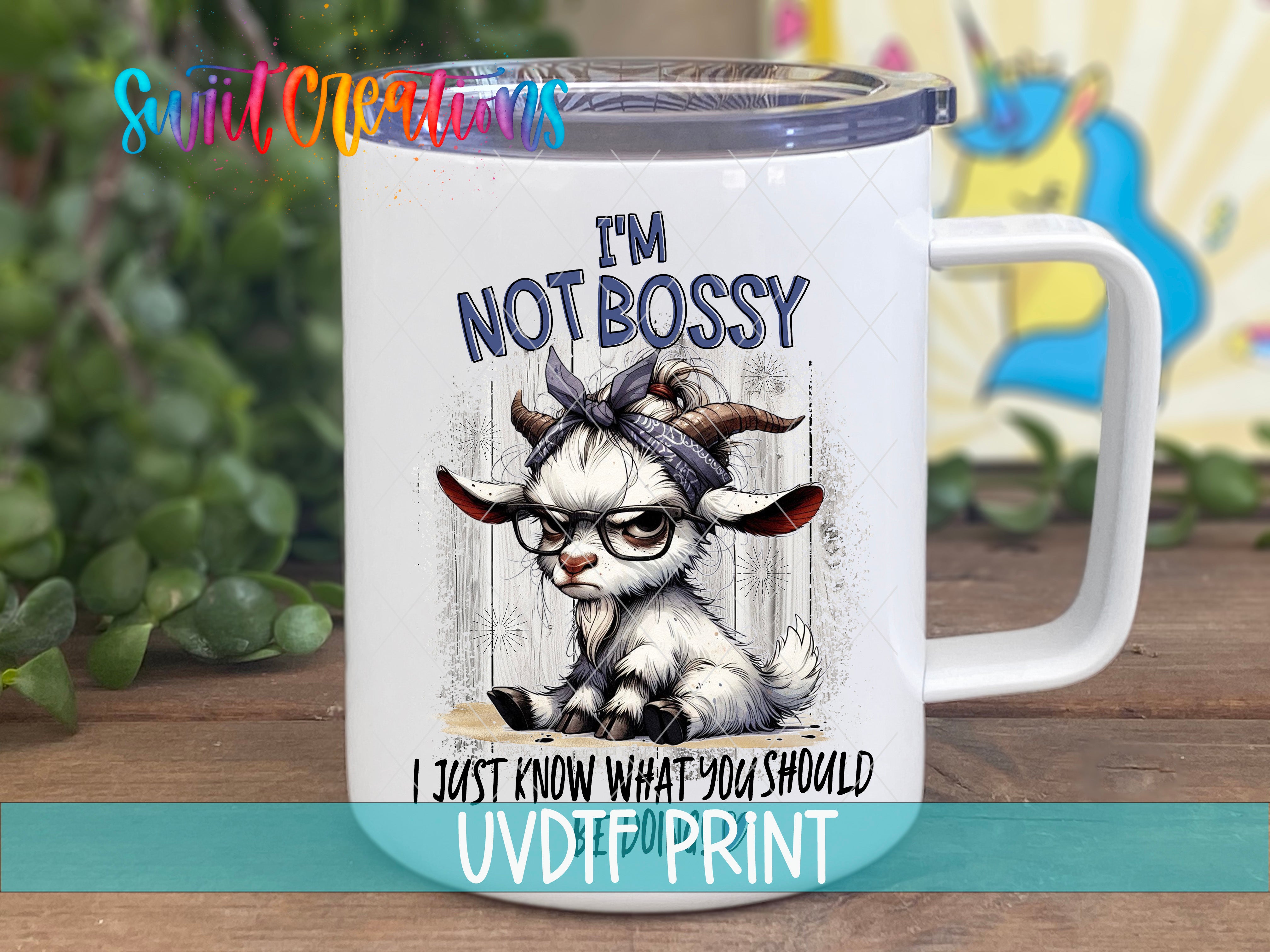 A white mug with a cartoon goat wearing glasses and a bandana, along with the text "I'm NOT BOSSY I JUST KNOW WHAT YOU SHOULD UVDIF PRINT".