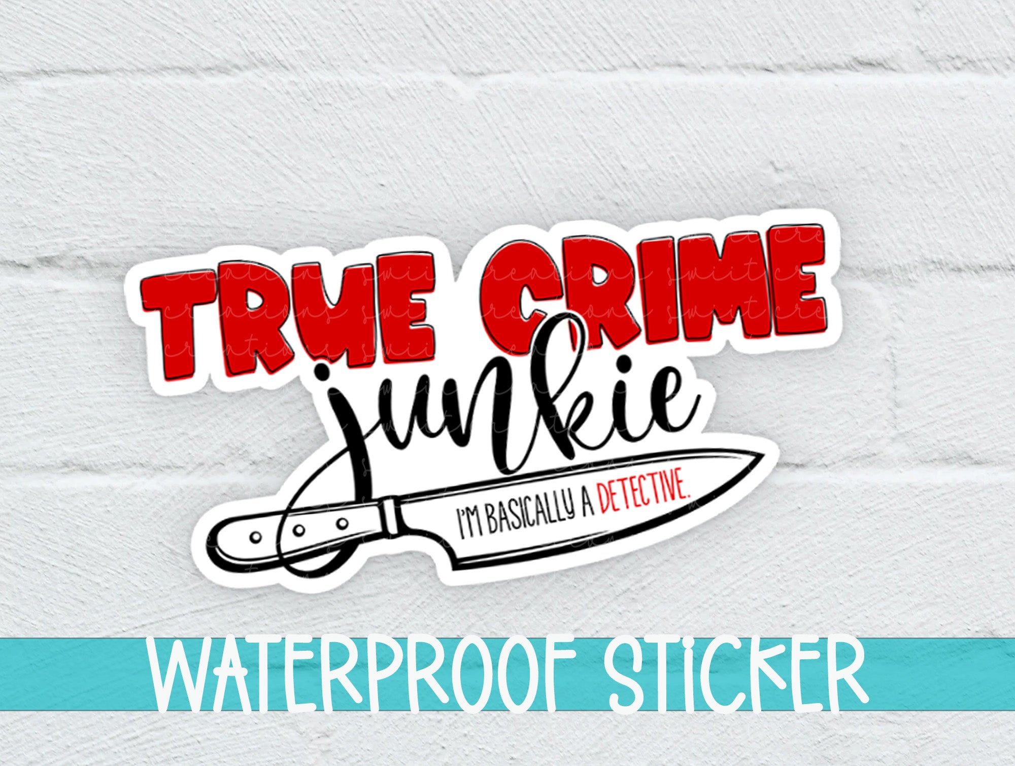 a white brick wall with a sticker of a knife