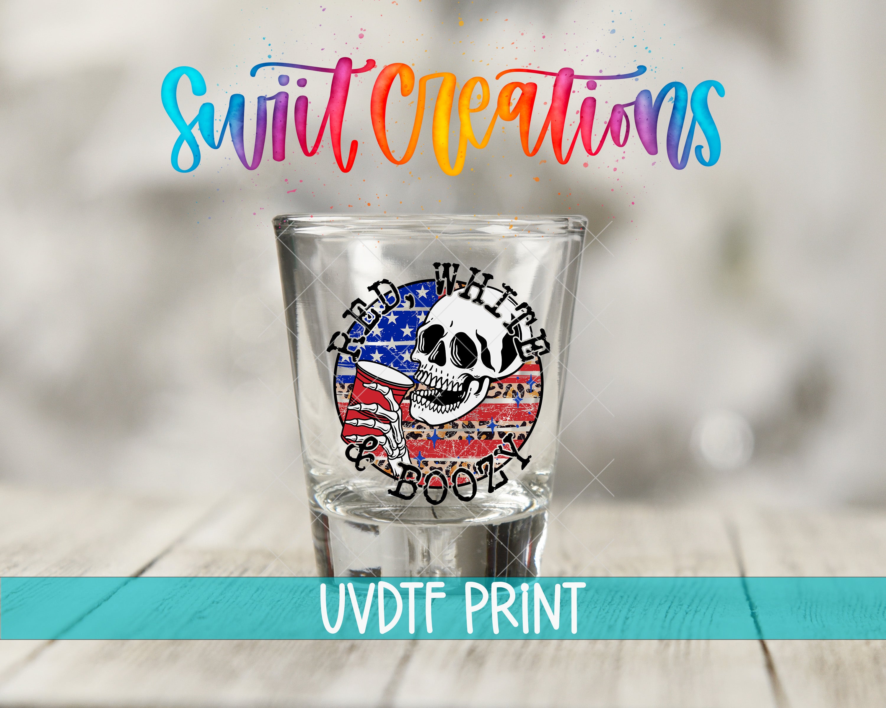 A shot glass with a skull design and an American flag pattern, along with the text "Swift Creations" and "UVDF PRINT" printed on it.