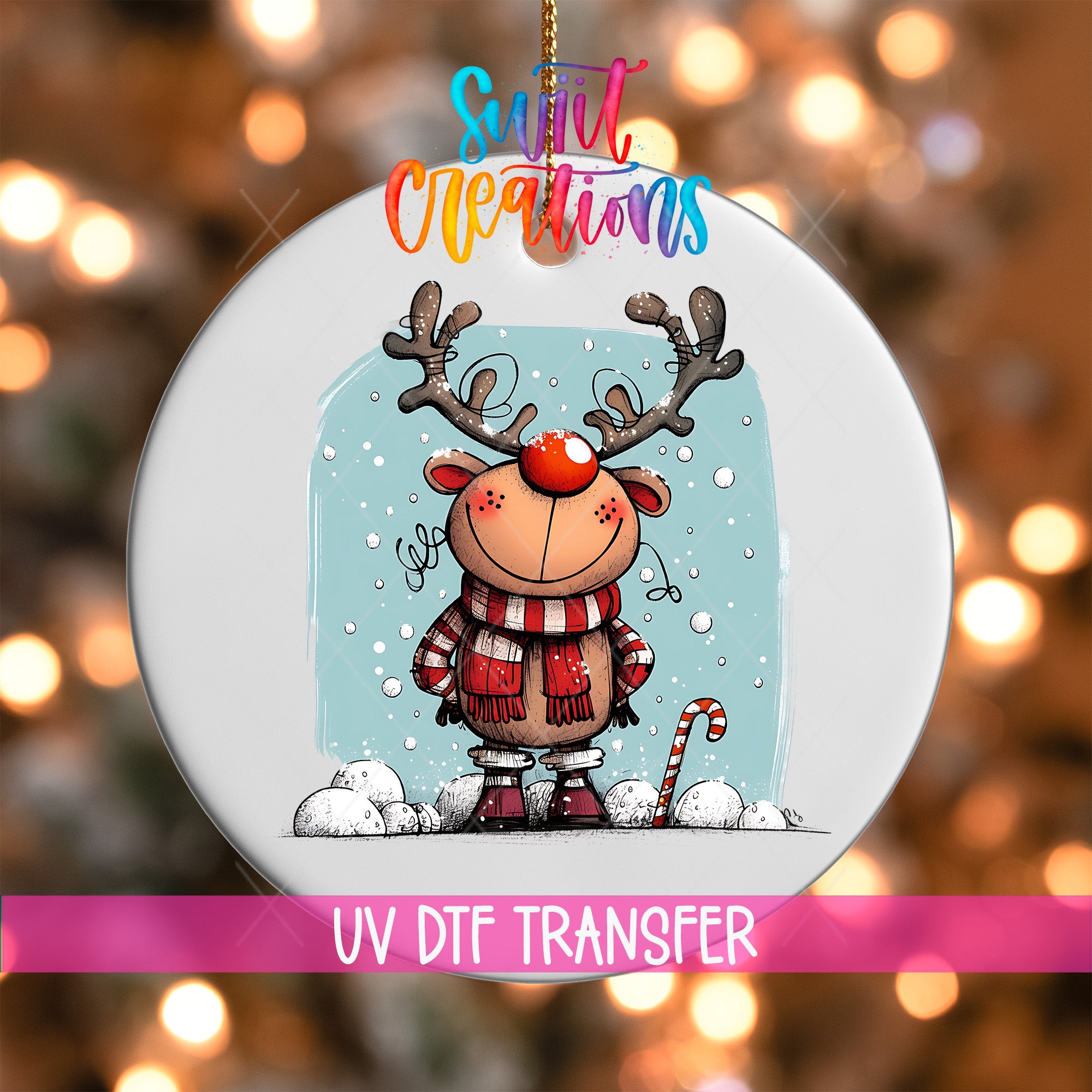 A white ornament with a cartoon reindeer wearing a red scarf and standing on a snowy surface, with snowflakes falling around it.
