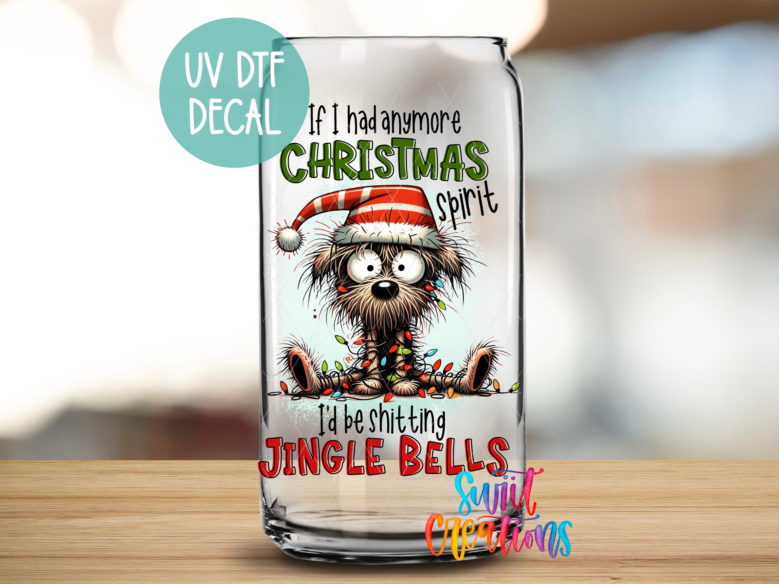 A glass can with a cartoon image of a dog wearing a Santa hat and the text "If I had anymore Christmas spirit, I'd be shitting Jingle Bells" printed on it.