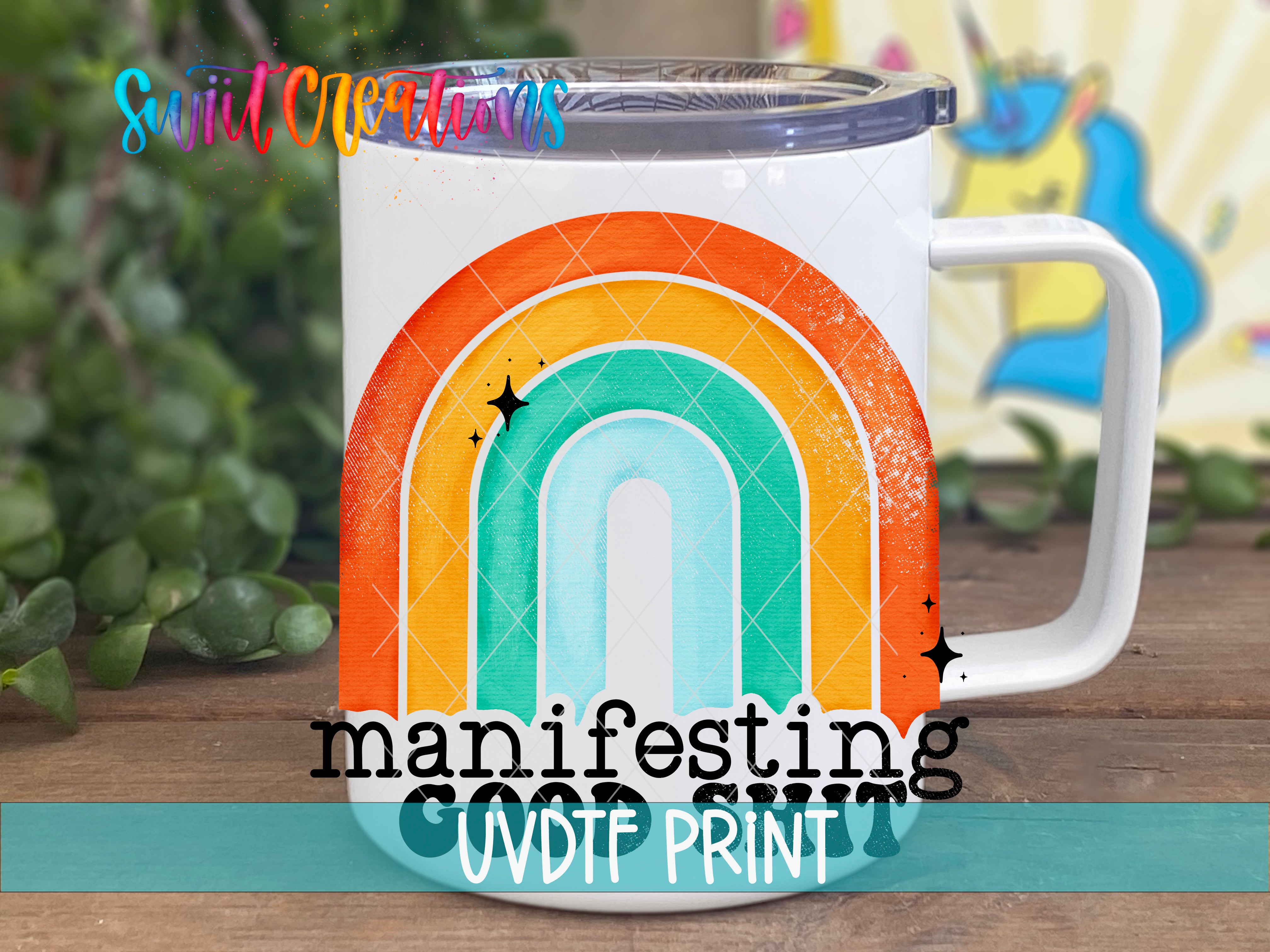 A colorful mug with a rainbow design, placed on a wooden surface with a blurred background.