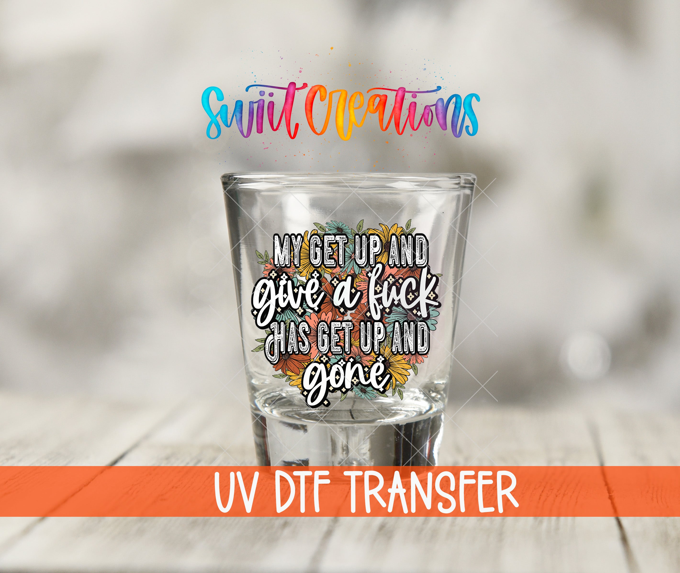 a shot glass with a colorful, hand-drawn quote on it, along with a logo for "Swift Creations" and a UV DFT Transfer text.