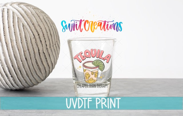 a shot glass with a tequila design and a ball, along with text that reads "Swift Creations UVDF PRINT".