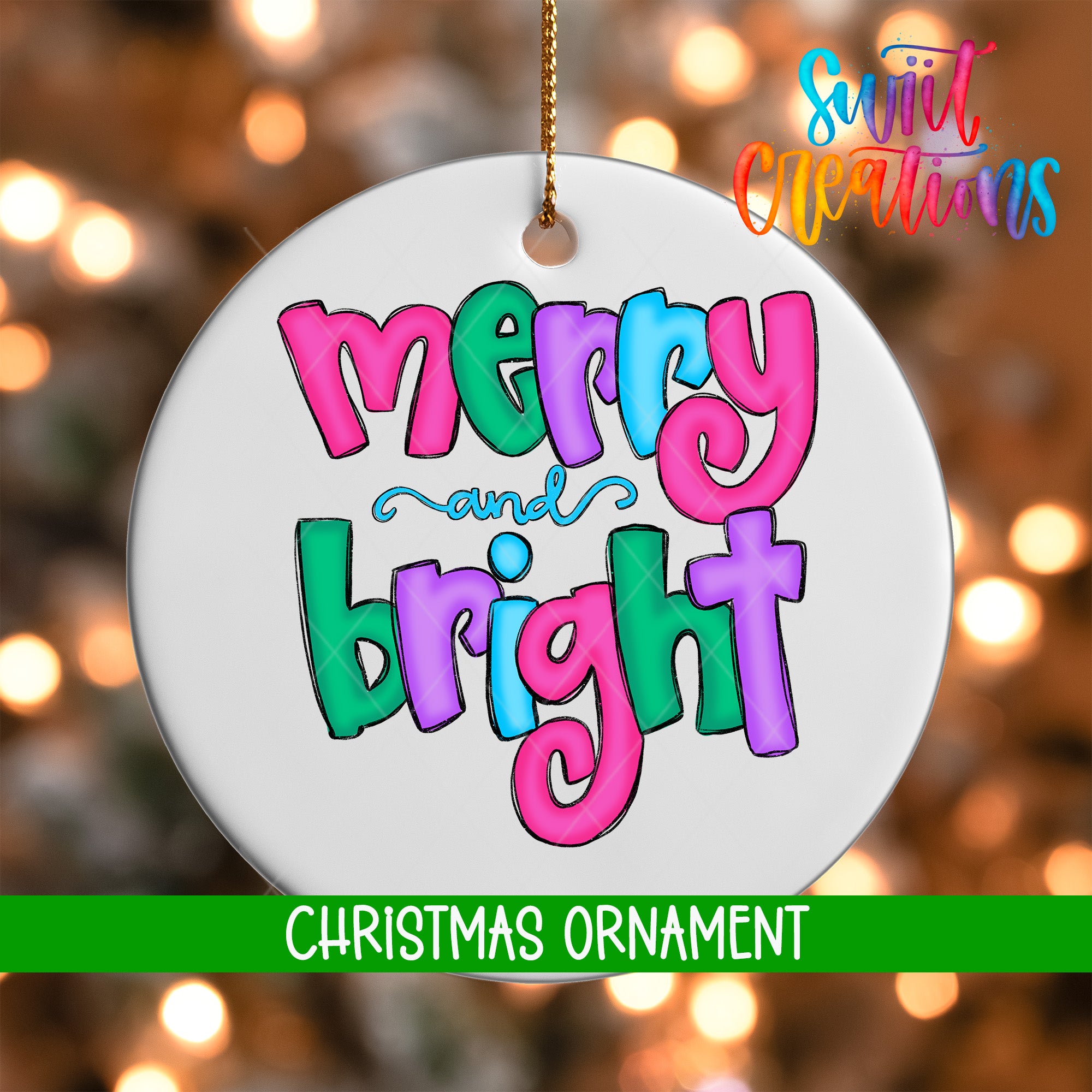A white Christmas ornament with the text "merry and bright" in colorful letters.