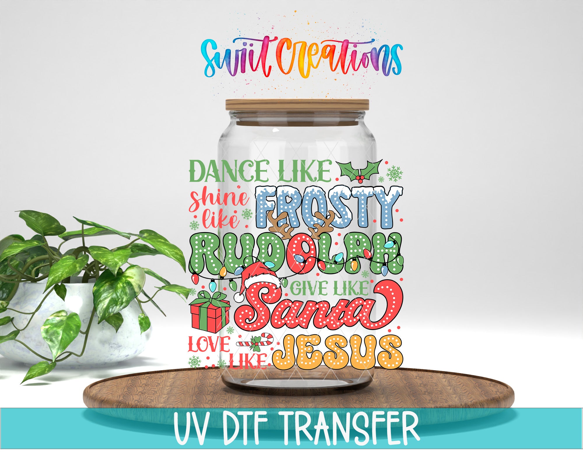 A glass jar with a lid, filled with colorful text that says "DANCE LIKE SHINE LIKE FROSTY RULPH RULPH RULPH SANA SANA JESUS LOVE LIKE JESUS" and "UV DDF TRANSFER". The jar is placed on a wooden tray, and there is a potted plant in the background.