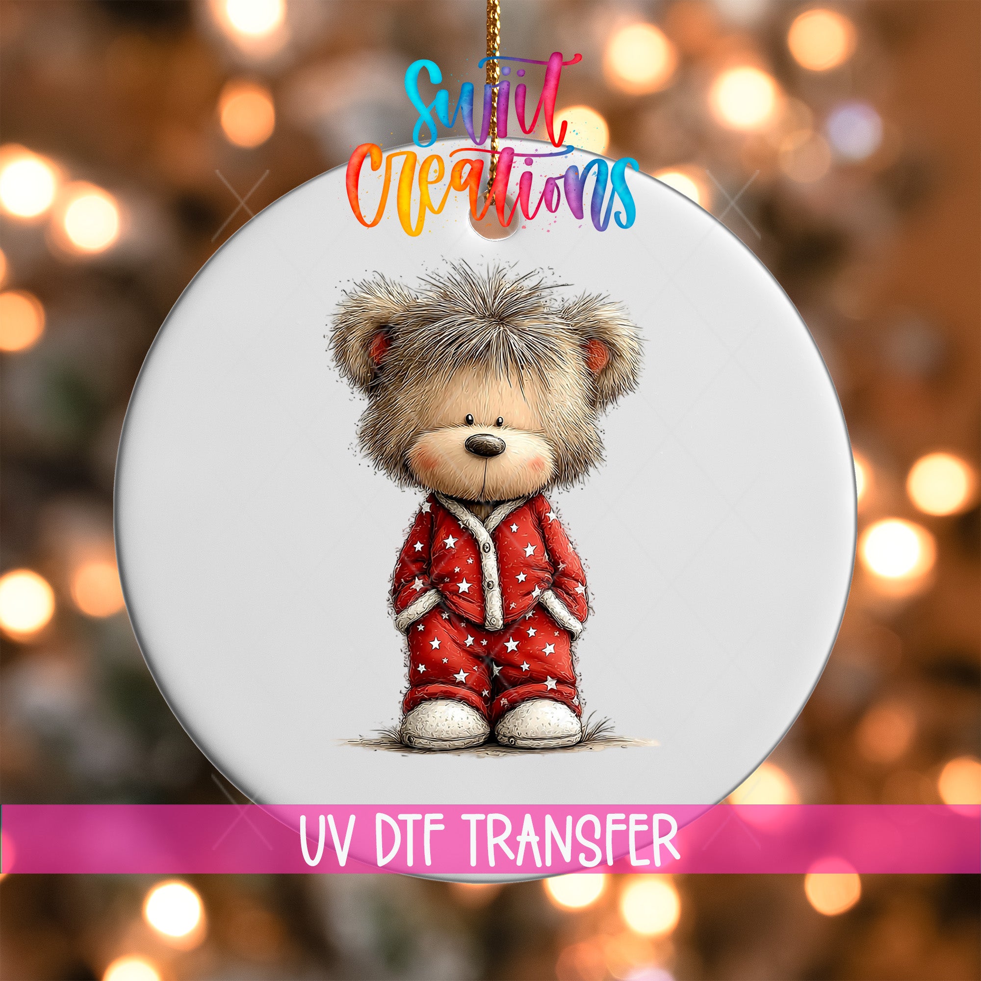 A white ornament with a teddy bear wearing a red outfit with white stars, set against a background of colorful lights.