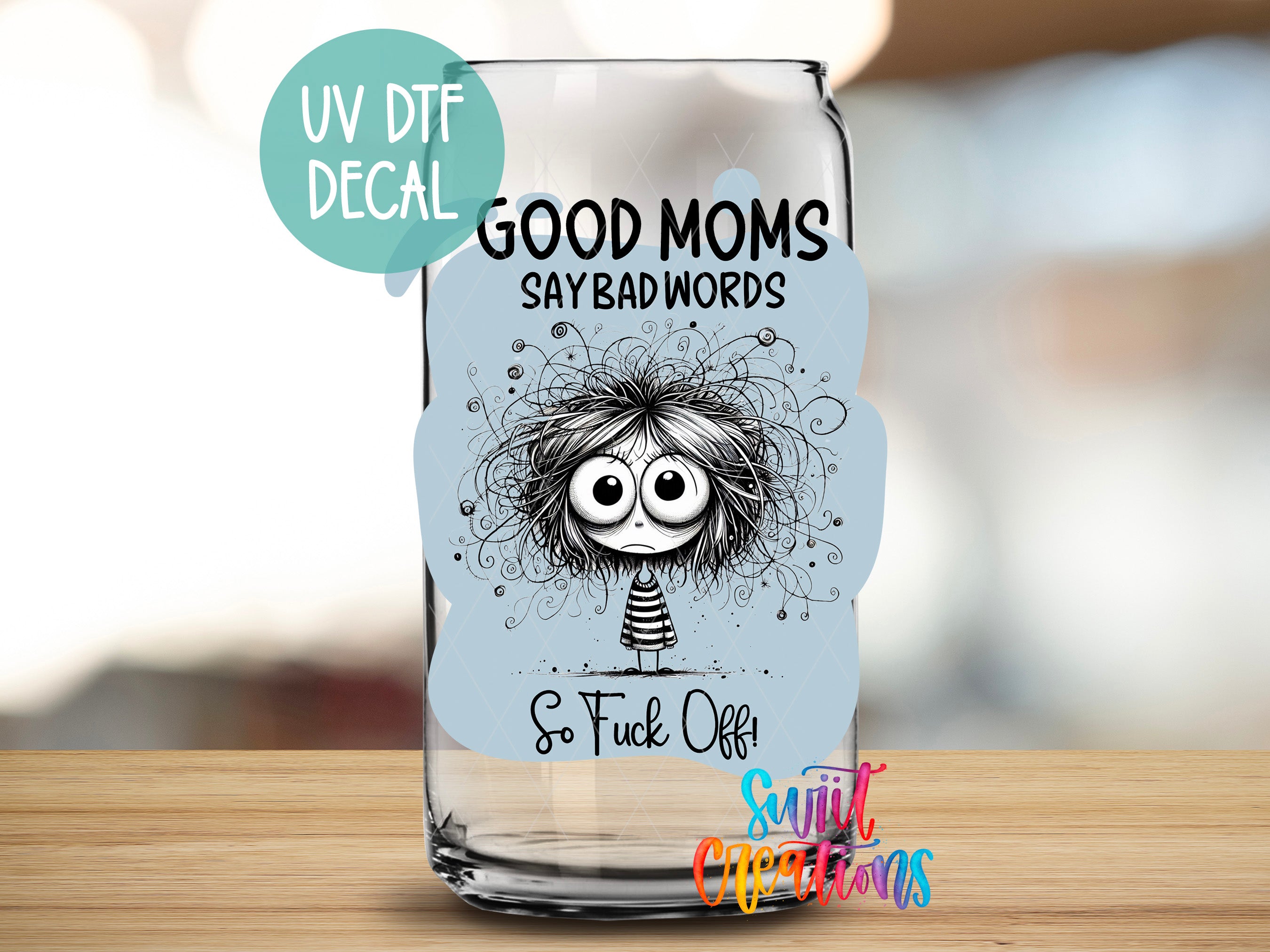 a glass with a picture of a woman's face on it