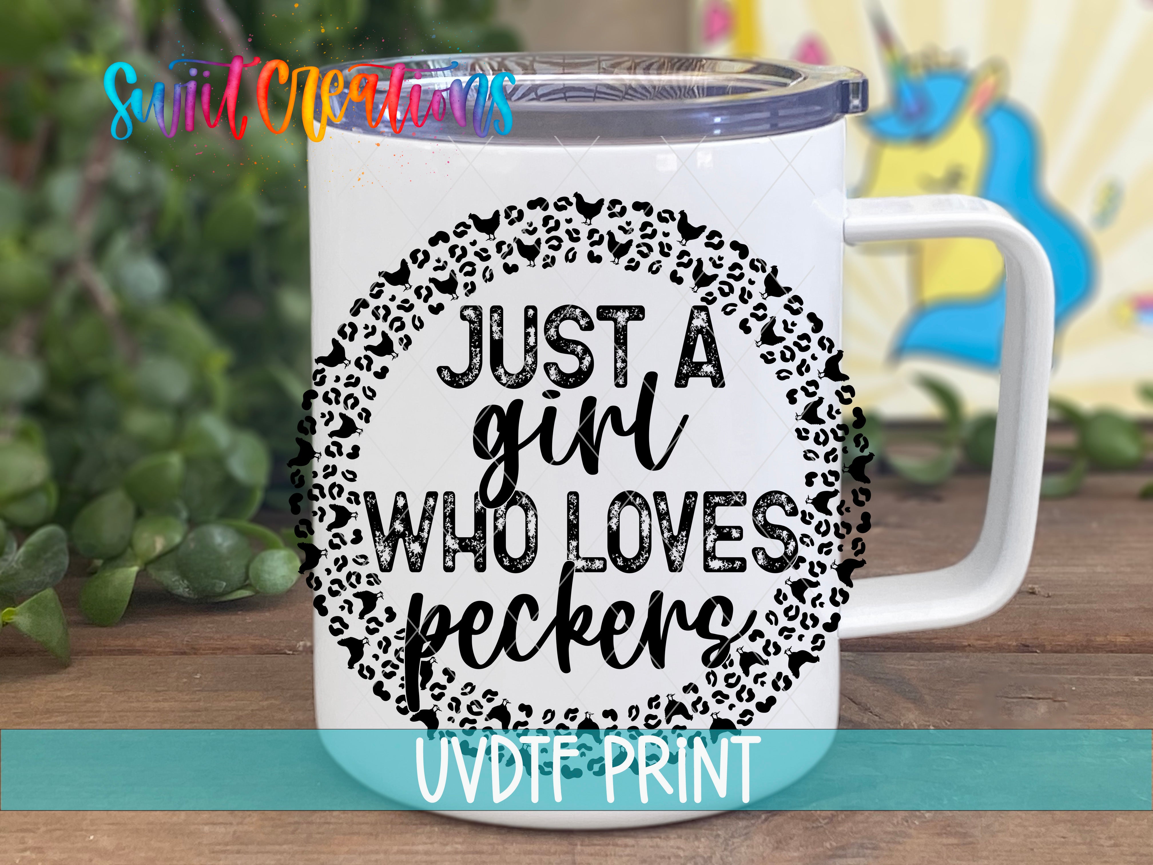 A white mug with a leopard print design and text printed on it, placed on a wooden surface.