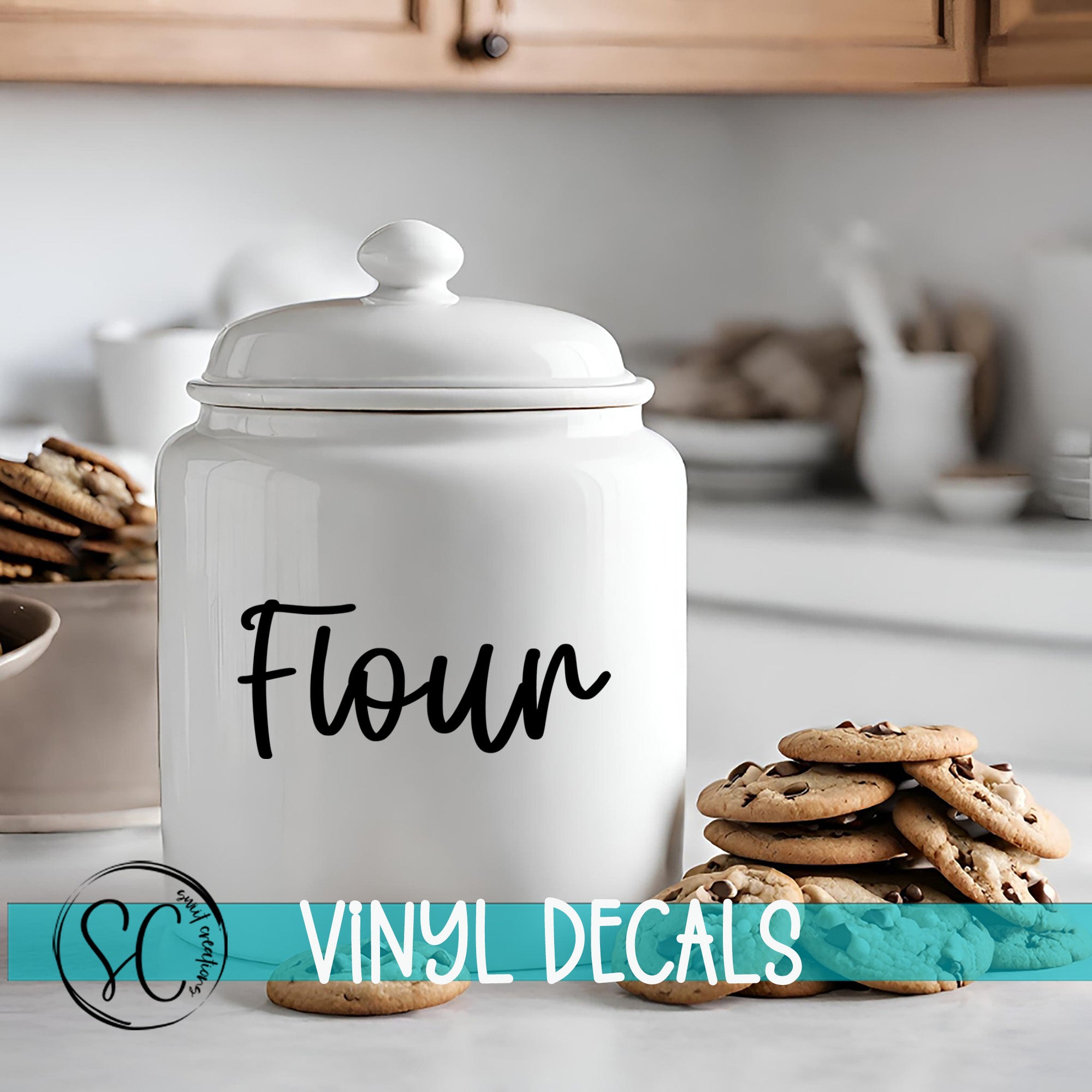 A white ceramic jar labeled "Flour" sits on a kitchen counter, surrounded by stacks of chocolate chip cookies.