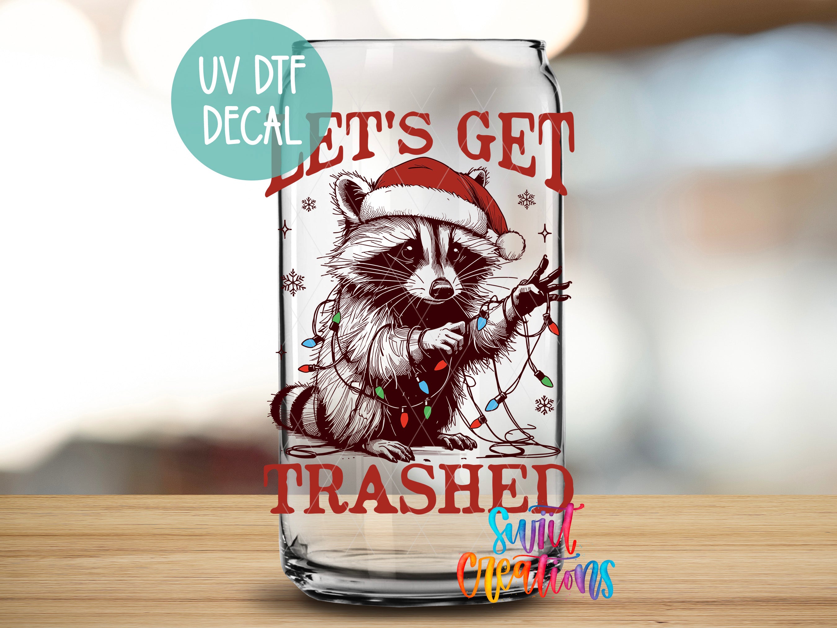 a glass with a raccoon wearing a santa hat