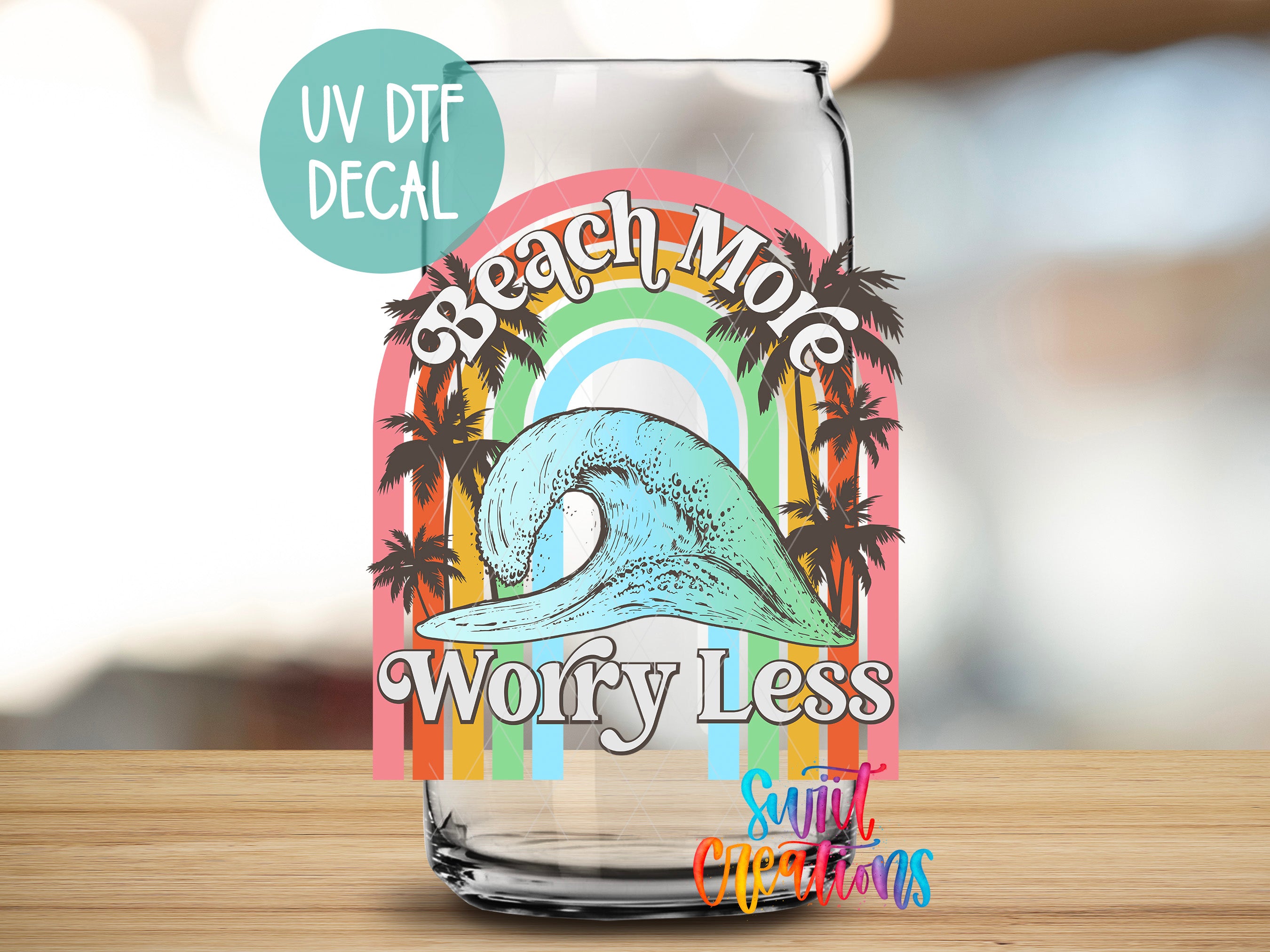 a glass with a picture of a wave on it