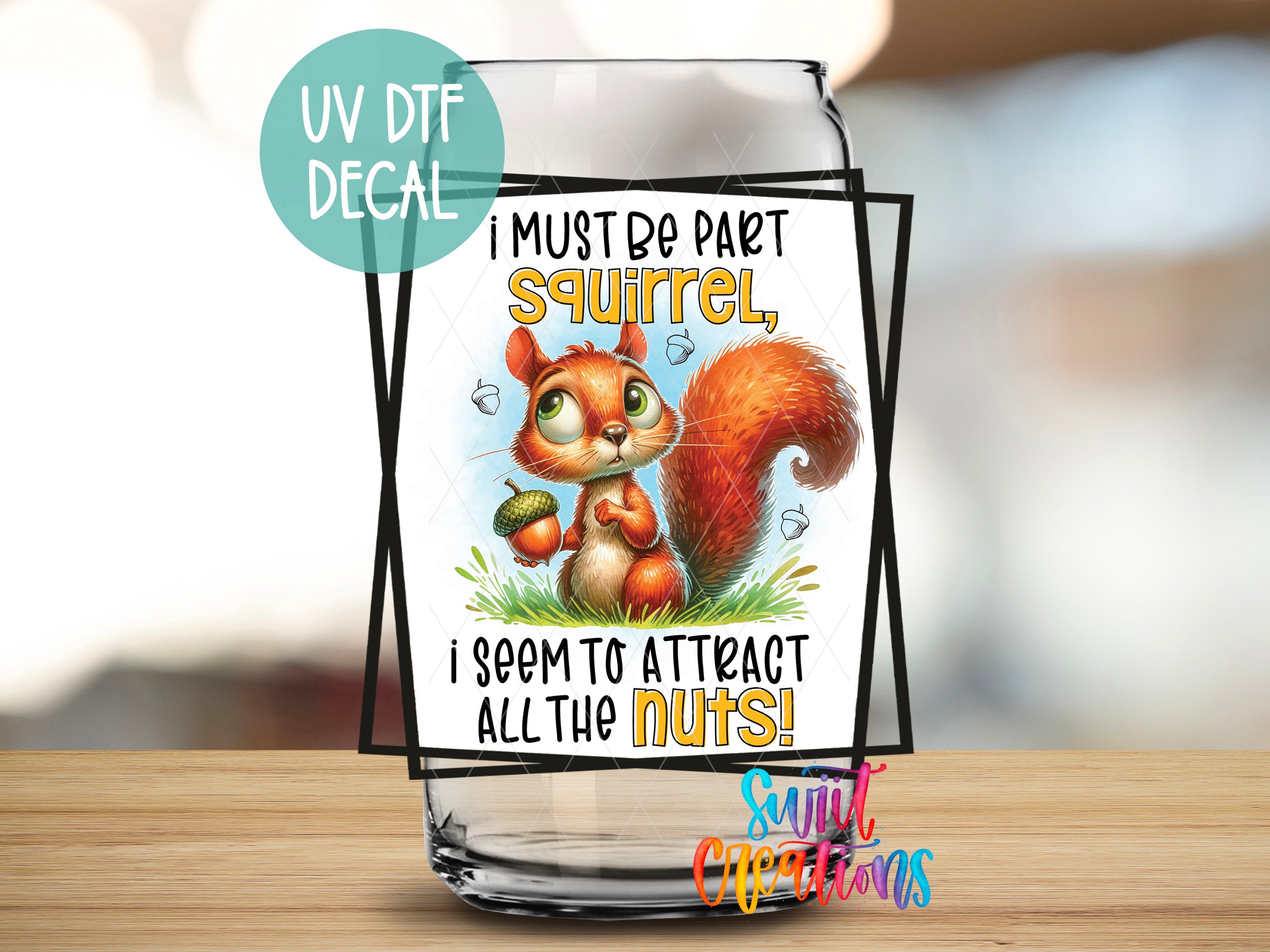 a glass with a picture of a squirrel on it