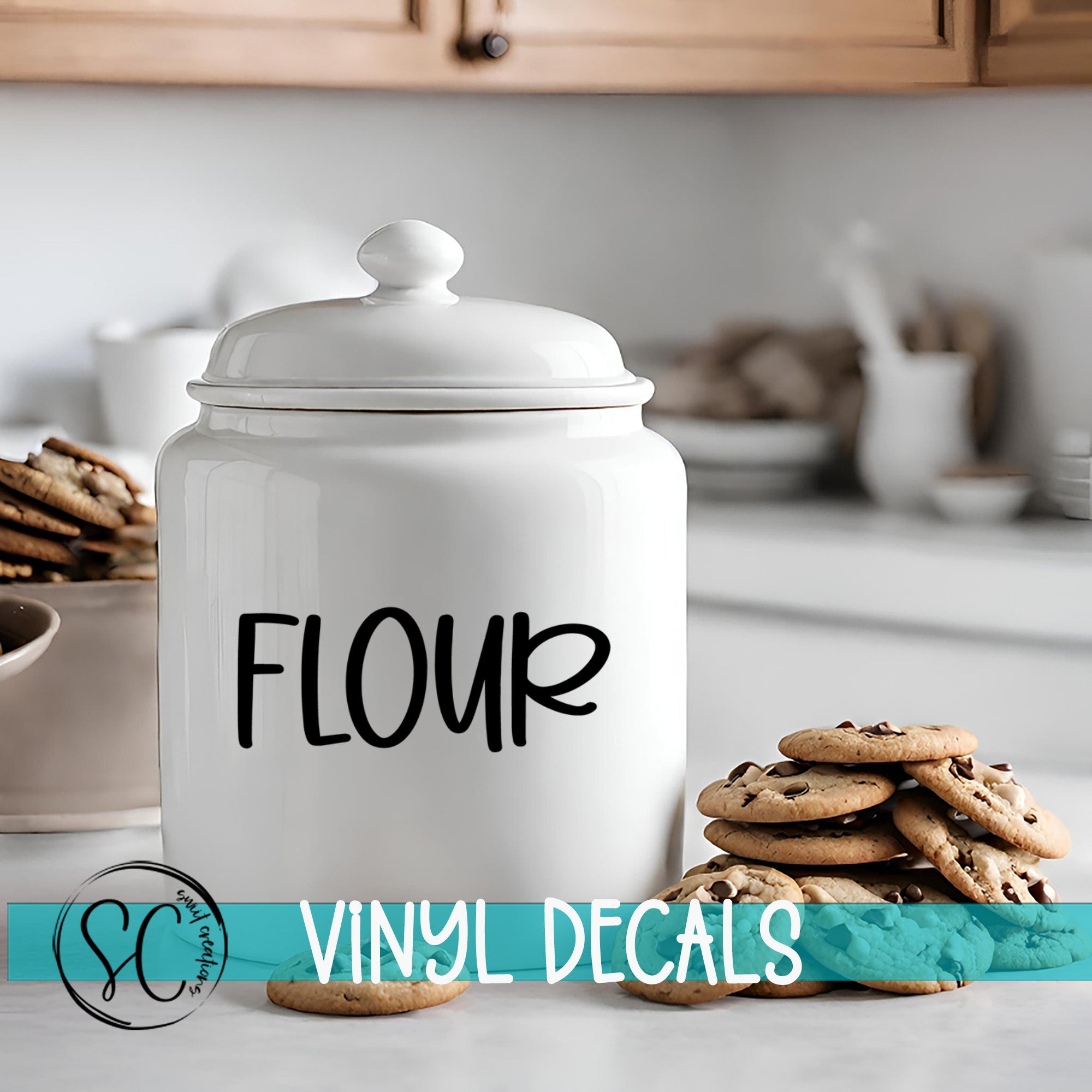 A white ceramic jar labeled "FLOUR" sits on a kitchen counter, surrounded by stacks of chocolate chip cookies.